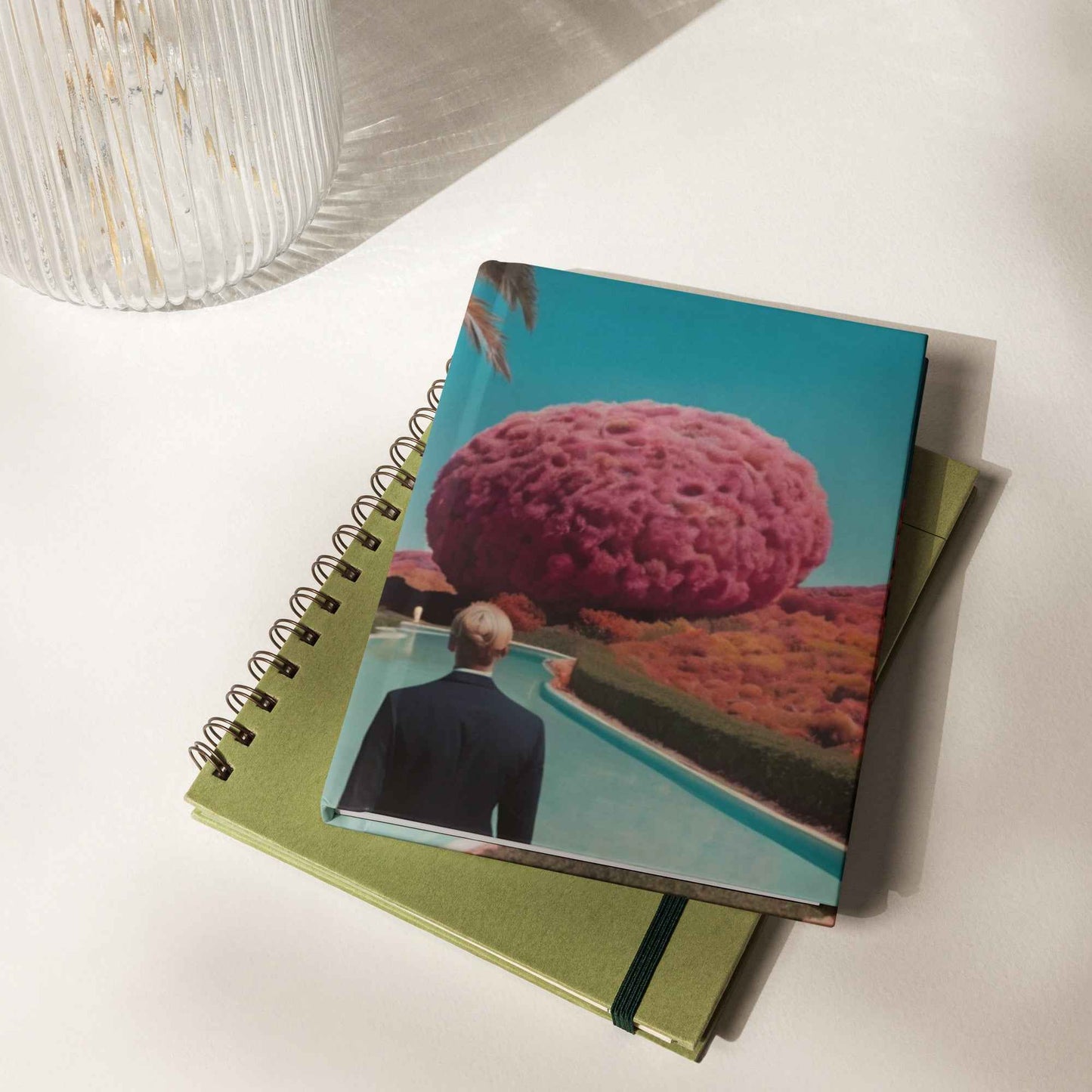 Matte hardcover journal on green notebook with spiral rings, teal pink landscape cover
