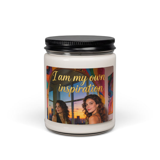 Soy candle jar with black lid, white wax, and colorful “I am my own inspiration” label