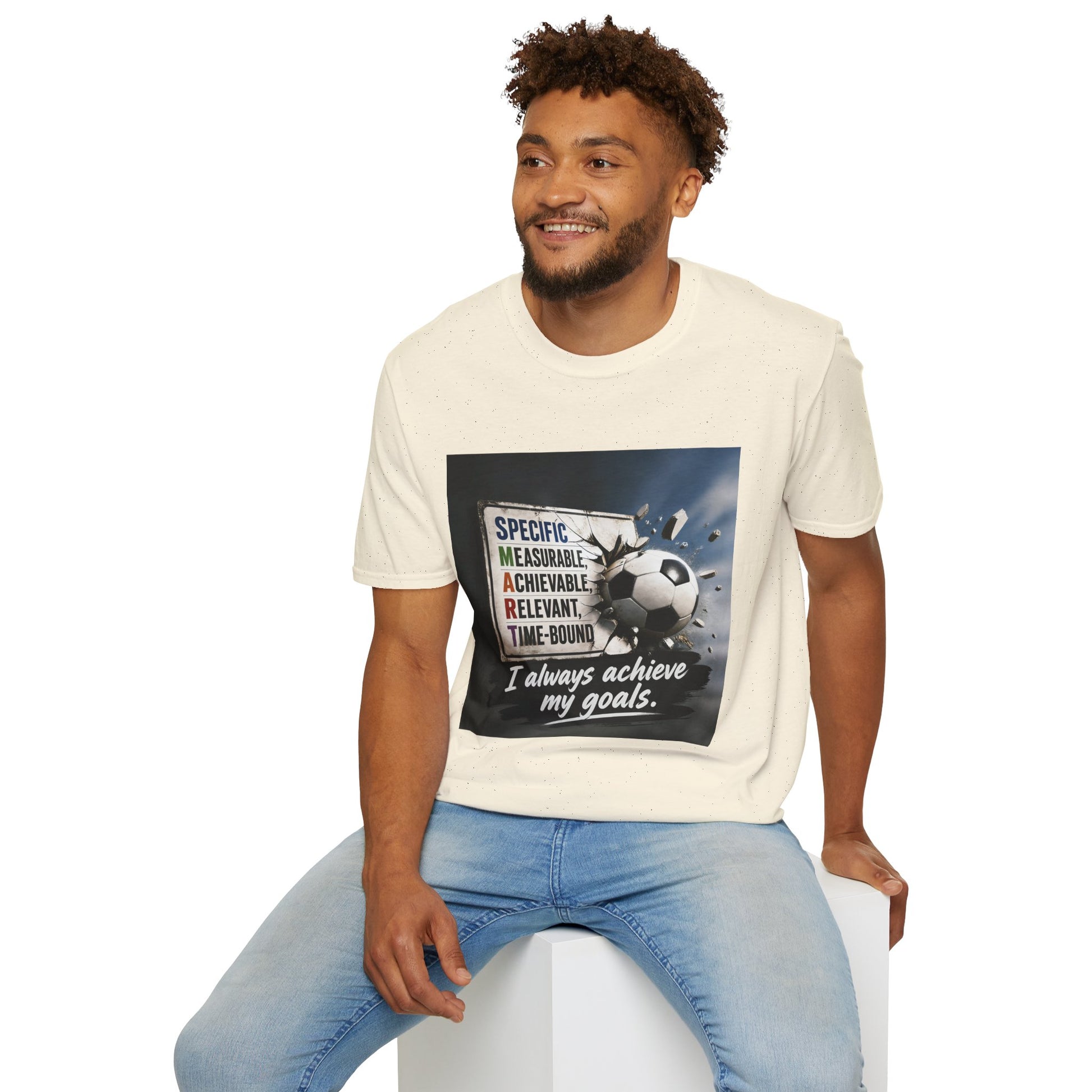 Unisex T-shirt, cream, crew neck; front soccer graphic and “I always achieve my goals” text.