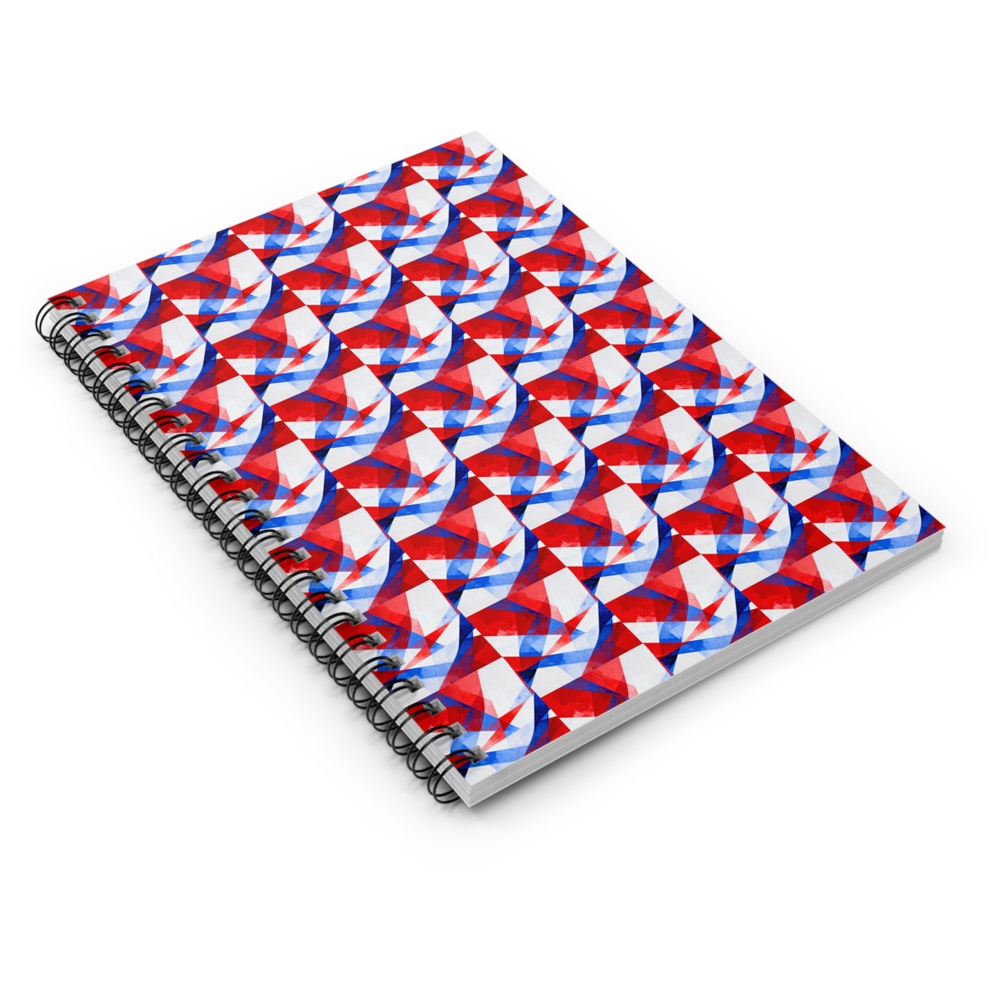 Ruled spiral notebook, red and blue geometric cover, angled view