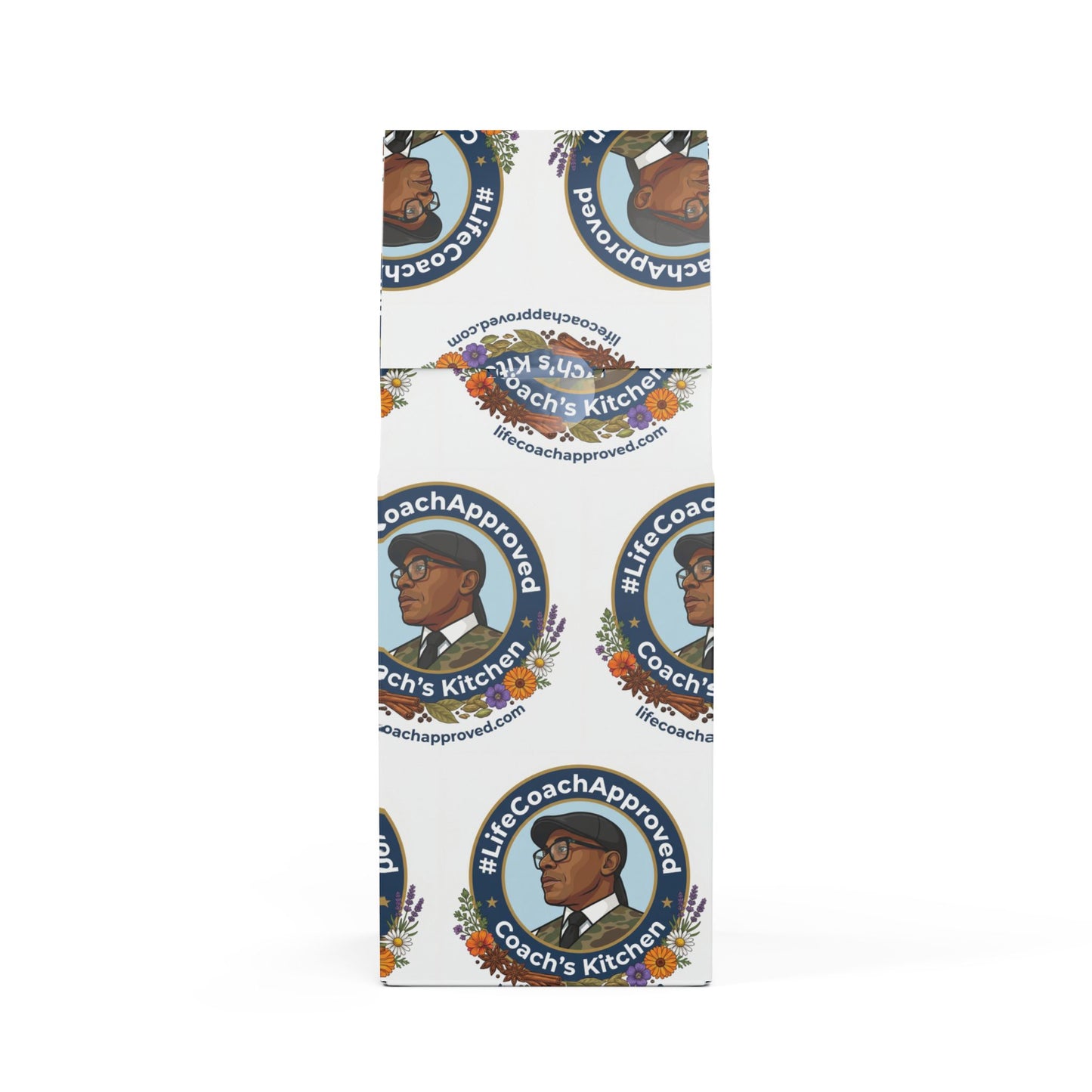 Coach’s Kitchen medium-dark coffee bag, angled side view with repeating badges