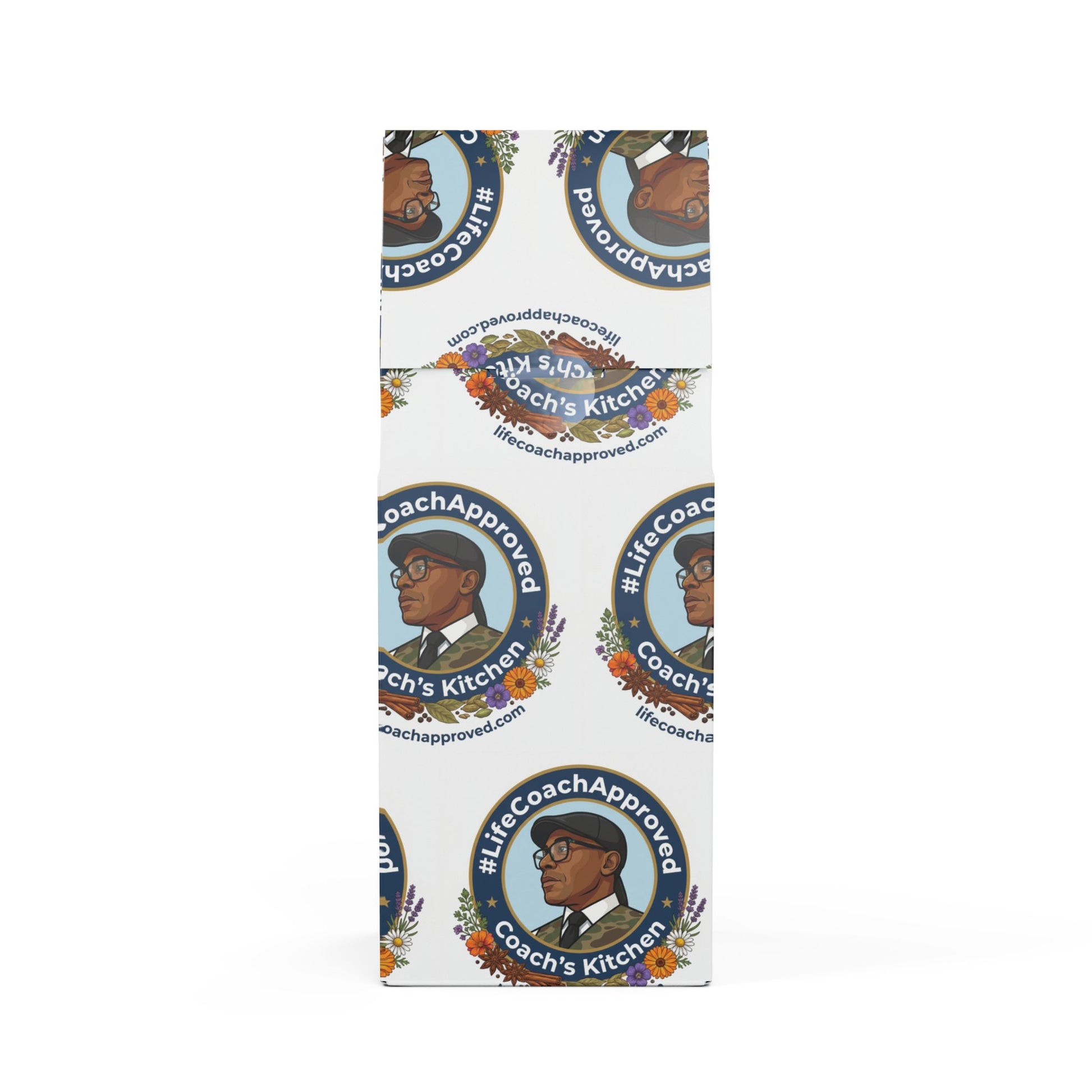 Coach’s Kitchen medium-dark coffee bag, angled side view with repeating badges