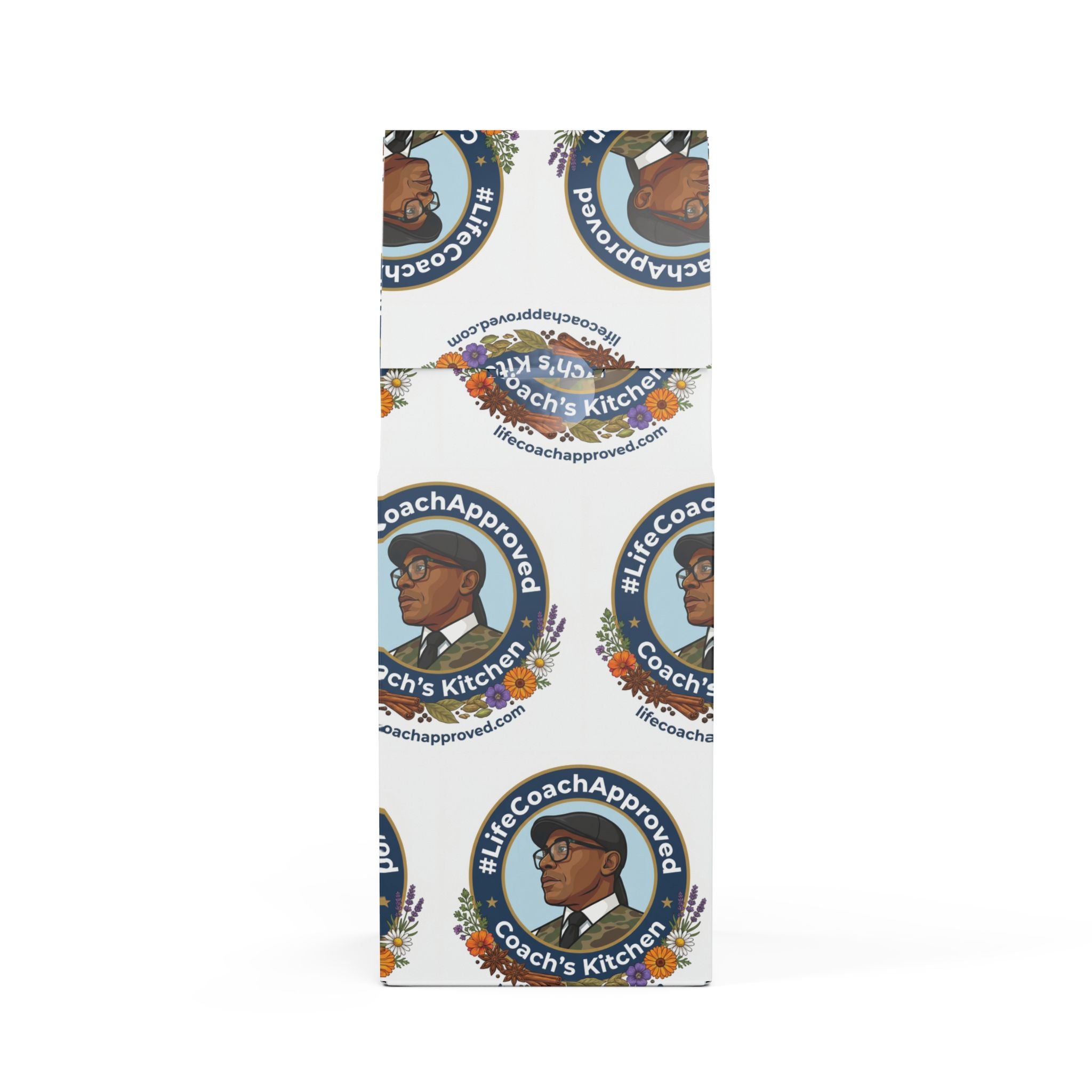 Coach’s Kitchen medium-dark coffee bag, angled side view with repeating badges