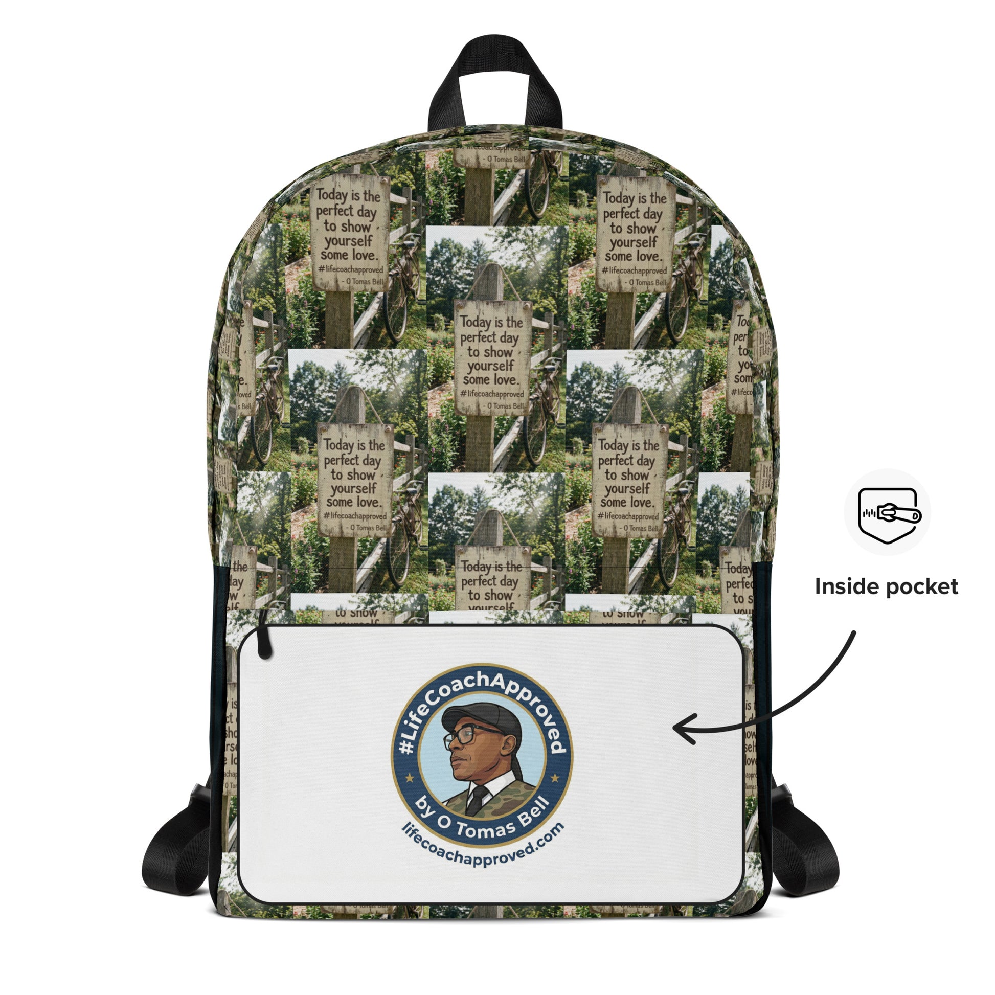 Printed canvas backpack with inside white pocket showing logo, black top handle