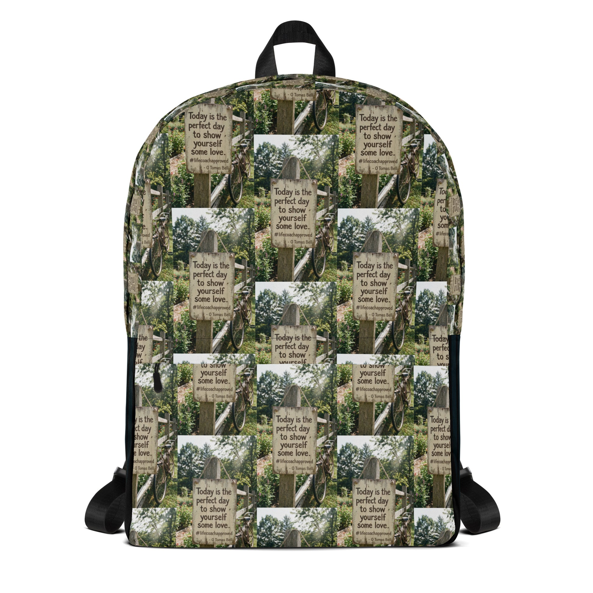 Self love backpack front view, green-and-beige collage print with black trim and handles