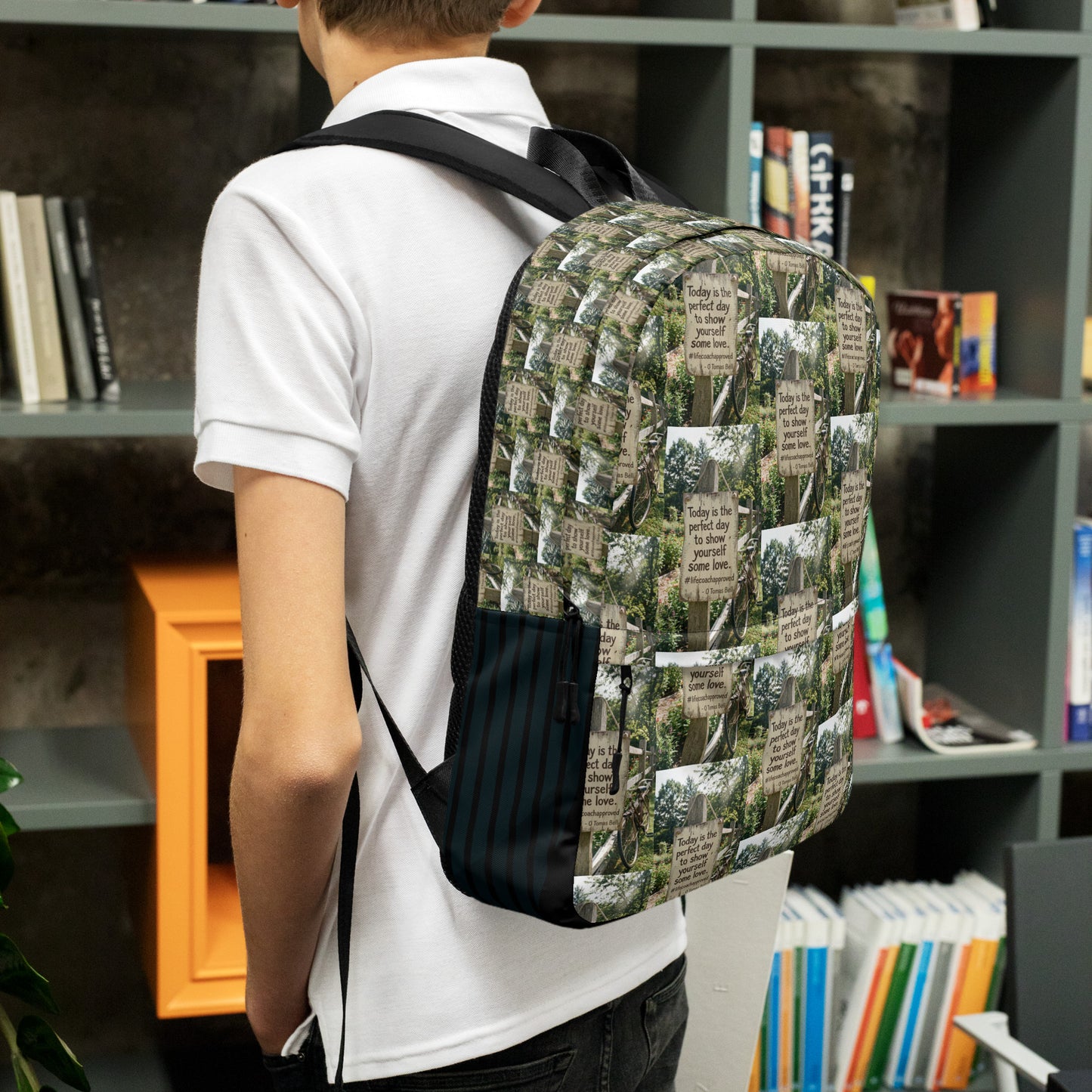 Printed canvas backpack with black front pocket and side drawstring detail