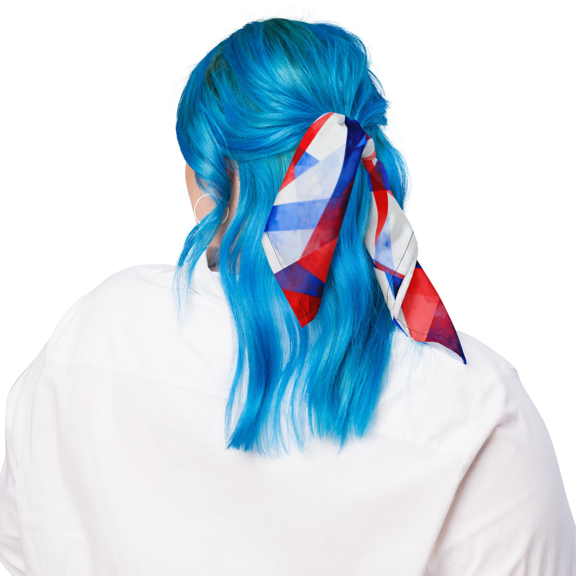 Red, white, and blue geometric bandana tied around blue hair
