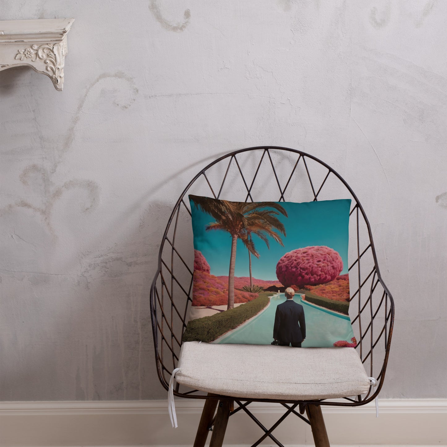Turquoise accent pillow cover with palm road, man from behind, and round pink tree