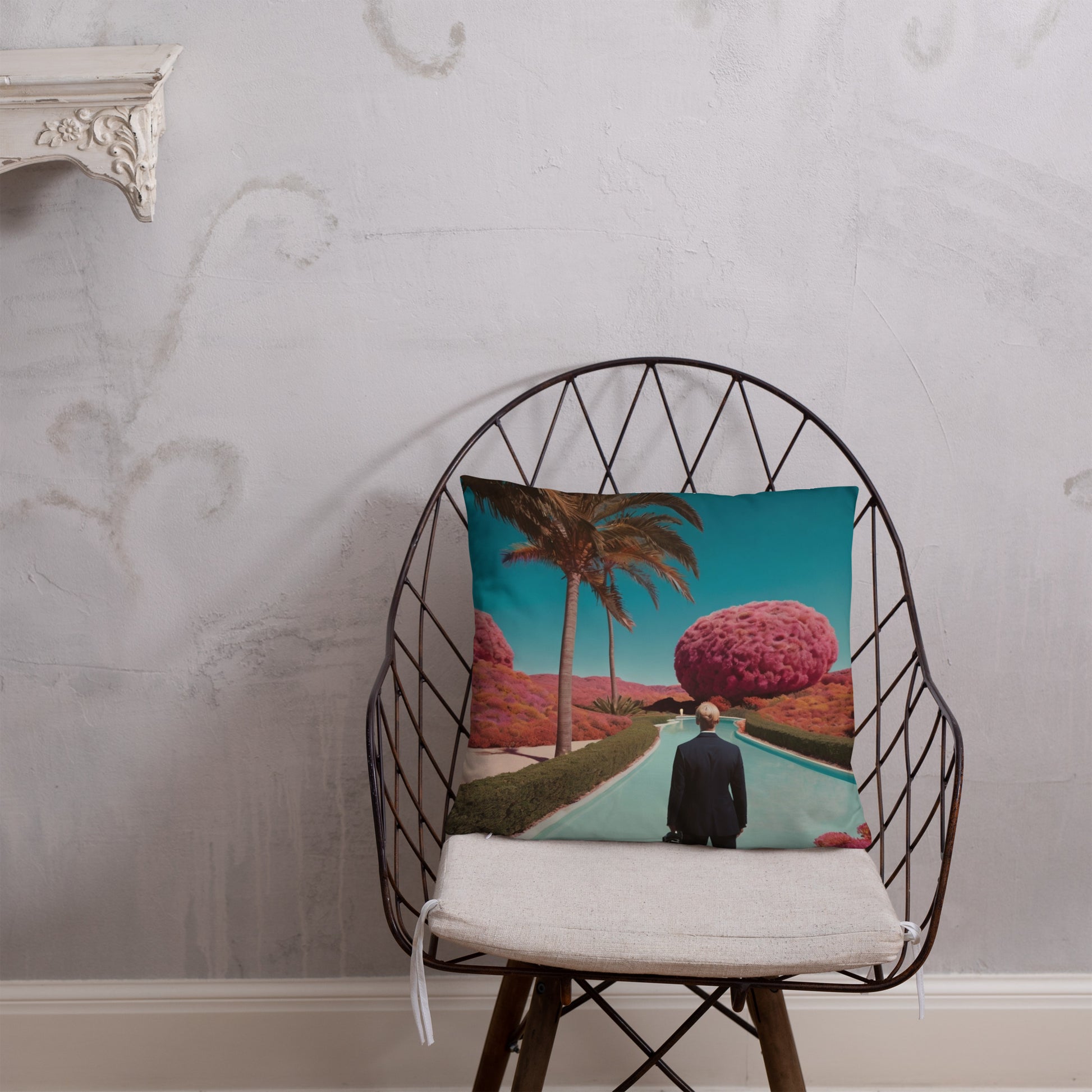 Turquoise accent pillow cover with palm road, man from behind, and round pink tree