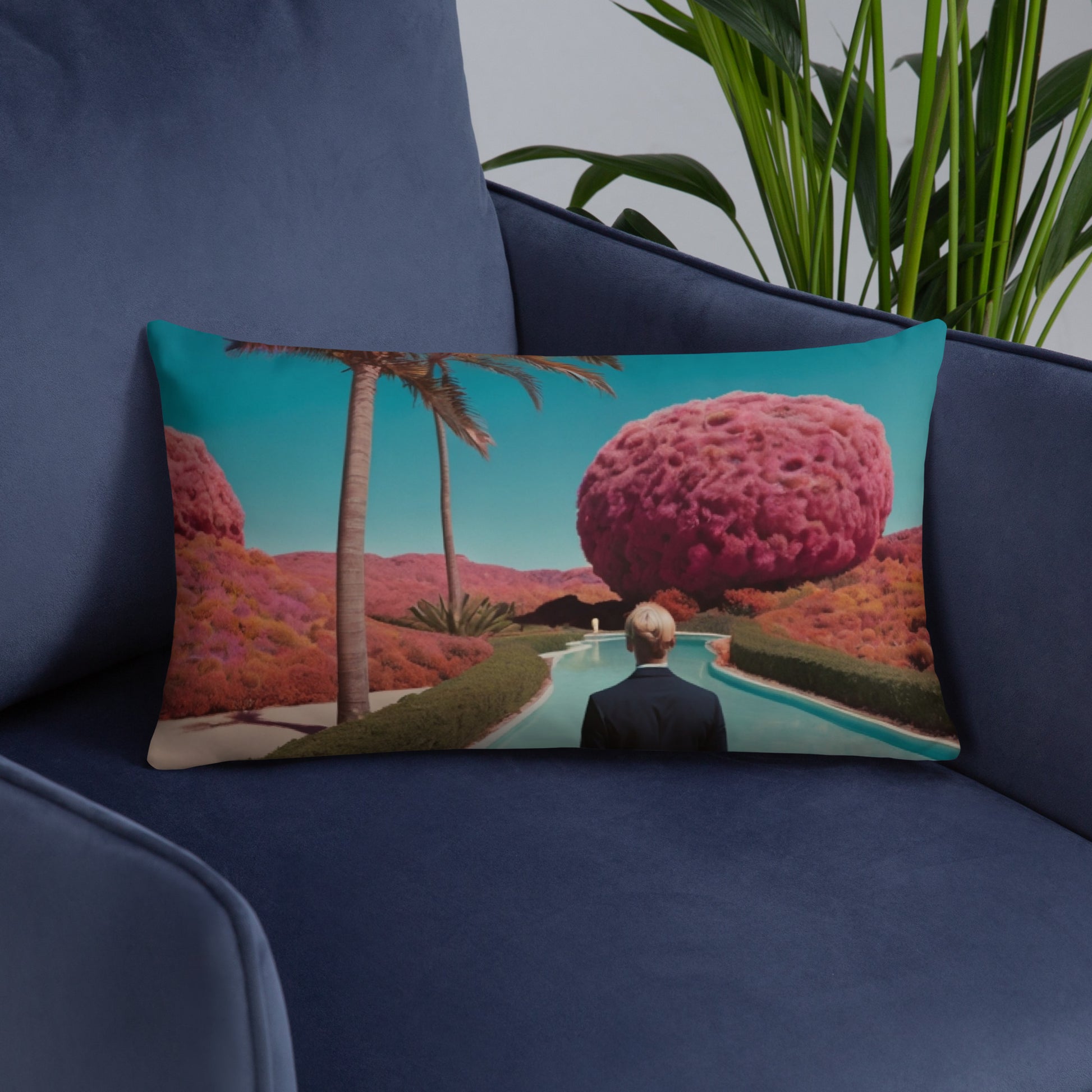 Rectangular accent pillow with teal landscape print showing large pink tree and river path