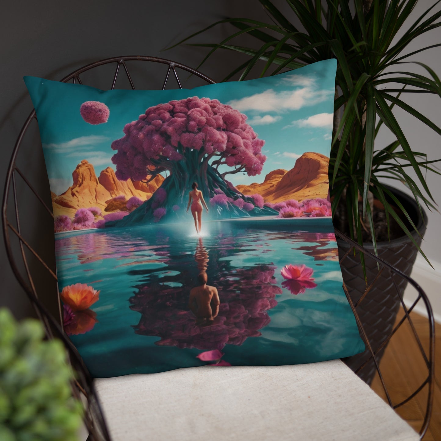 Rectangular accent pillow with teal landscape print, large pink tree, palm silhouettes, and river