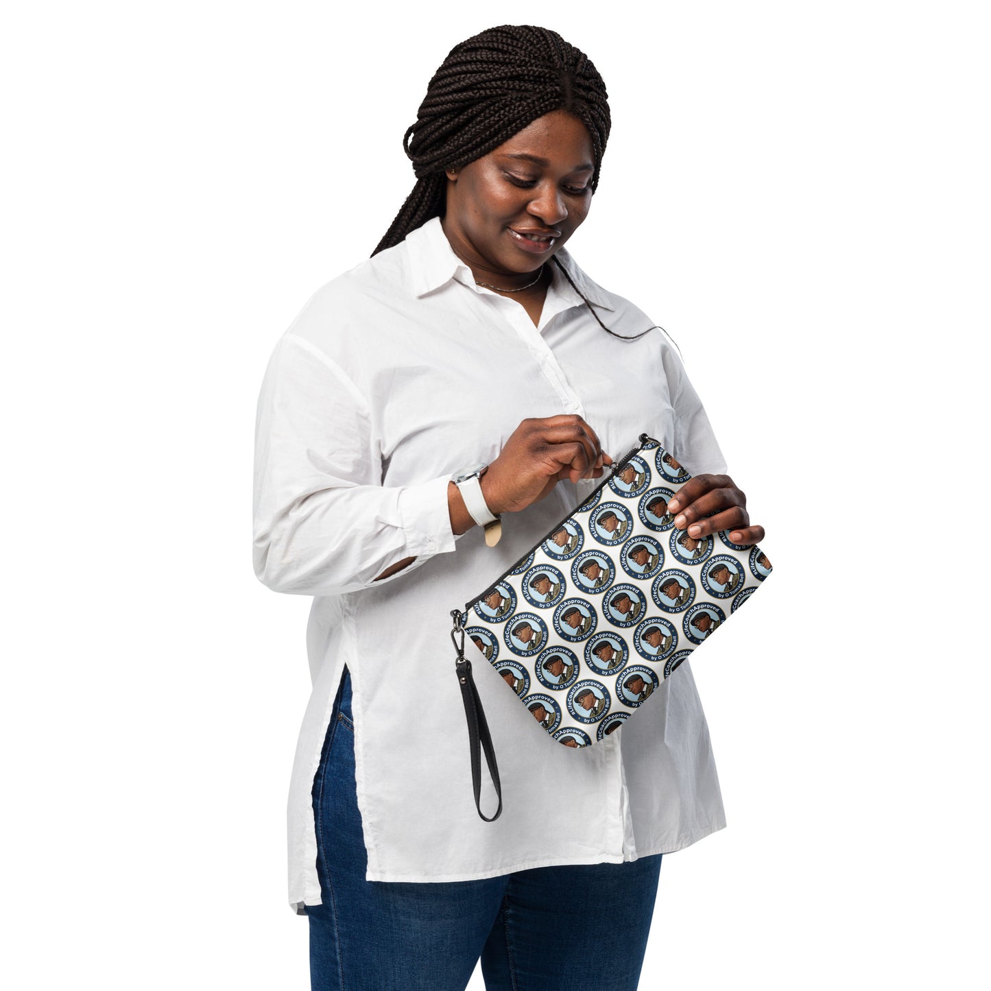 Pattern crossbody bag with black wrist strap and zip top, round portrait print