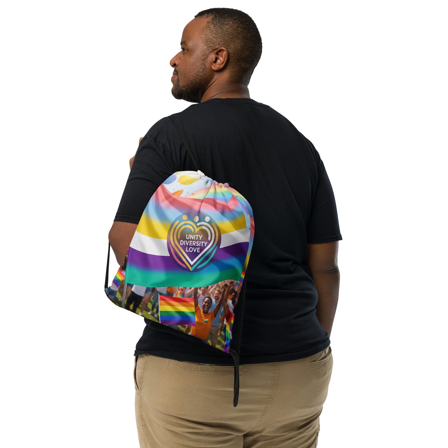 Drawstring bag worn on back with rainbow heart design and black cords