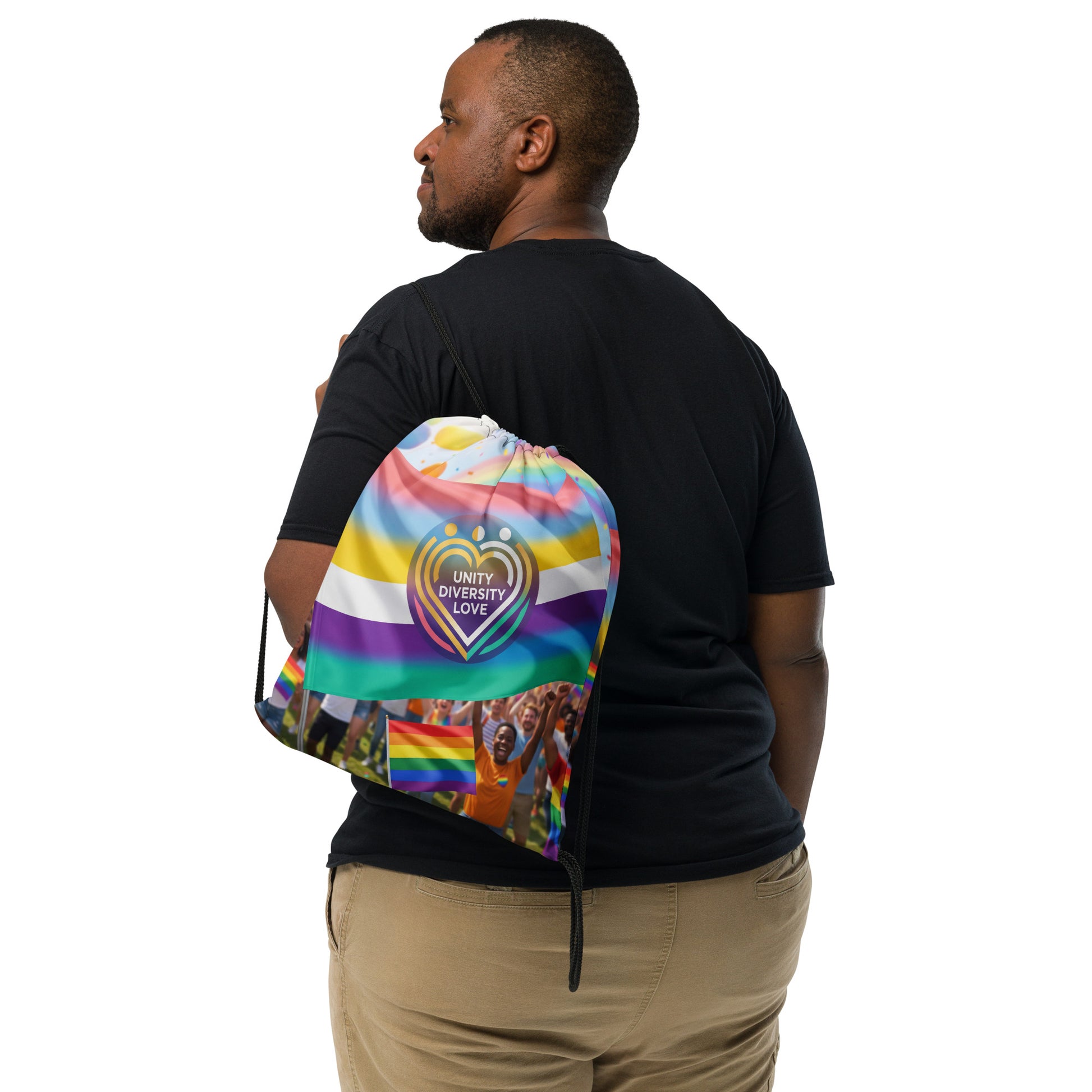 Drawstring bag worn on back with rainbow heart design and black cords