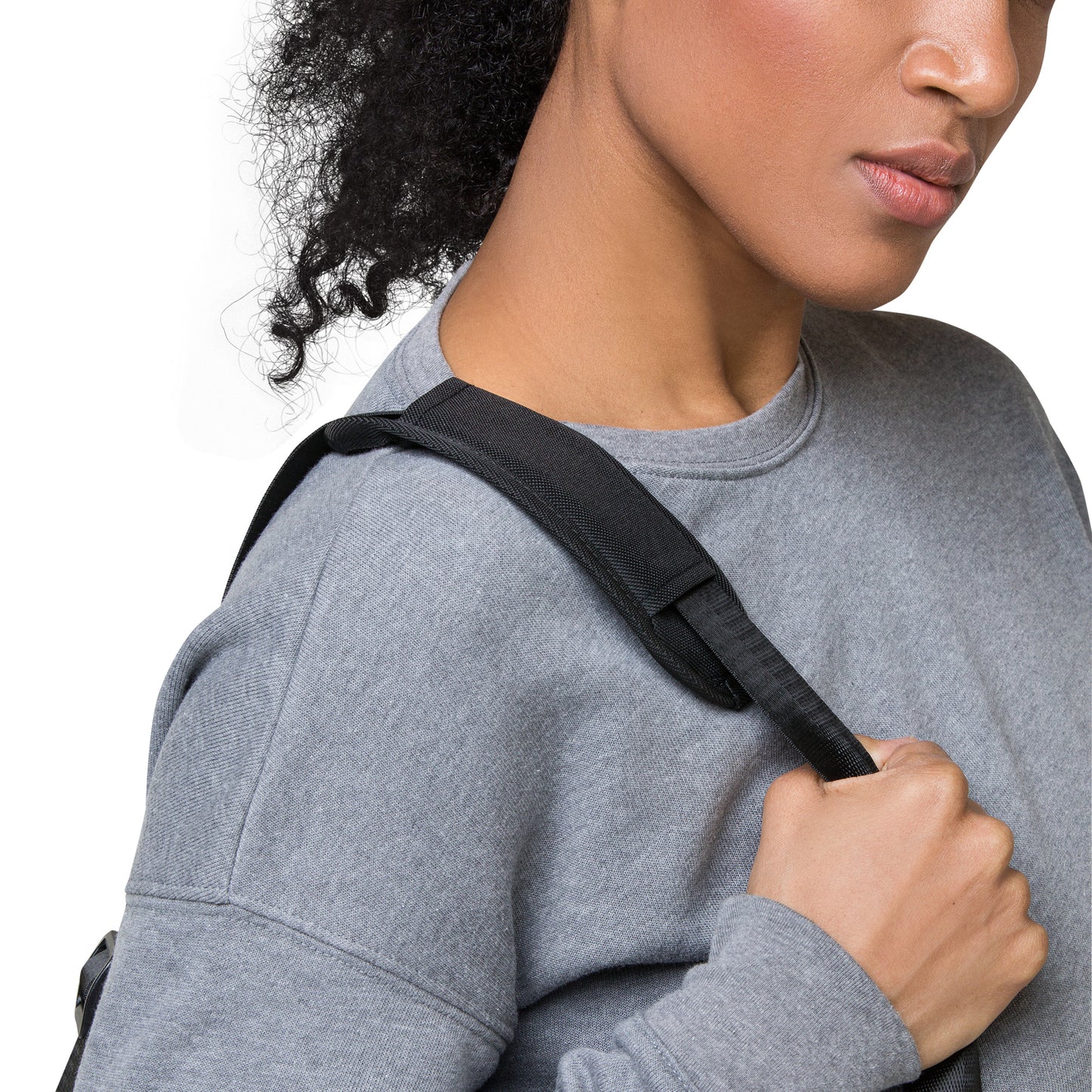Self-love duffle bag on shoulder, black strap and top carry handle