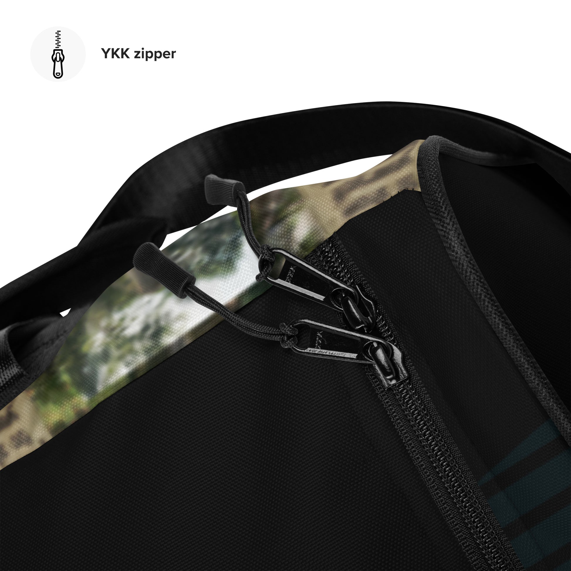Self-love duffle bag zipper detail with fabric top edge and printed panel