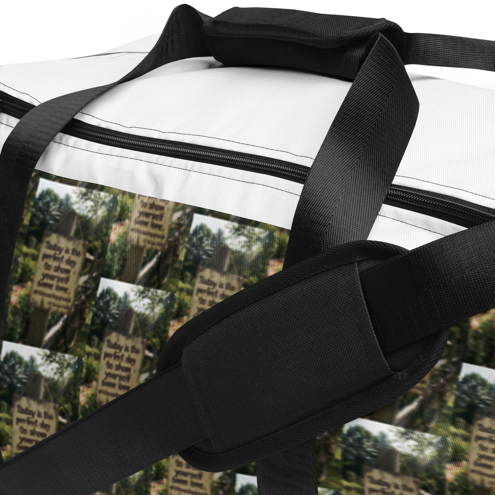 Duffle bag top with black strap and black zip closure over white fabric front panel