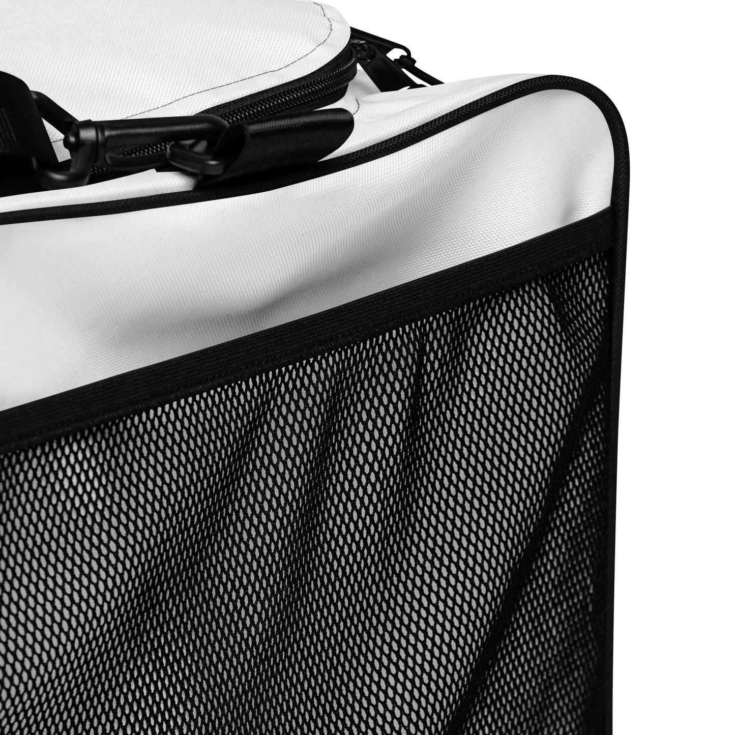 Close-up of black mesh side panel and zipper edge on a white duffle bag