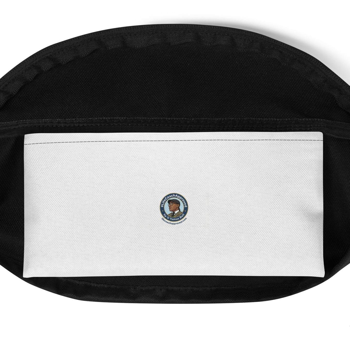 Black fanny pack with white label patch and small circular emblem on back.