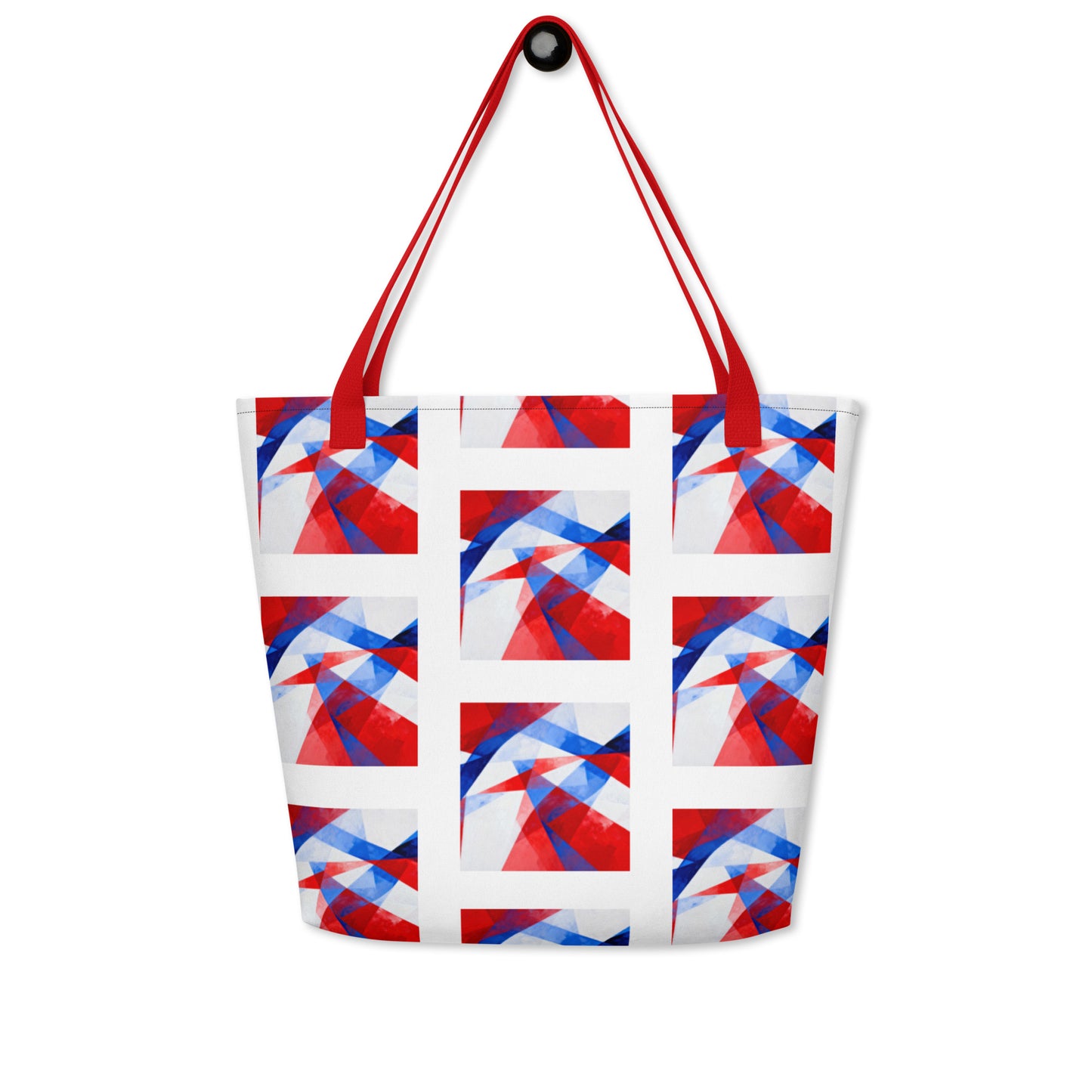 Beach tote bag front view with red handles and white, red, and blue geometric block print