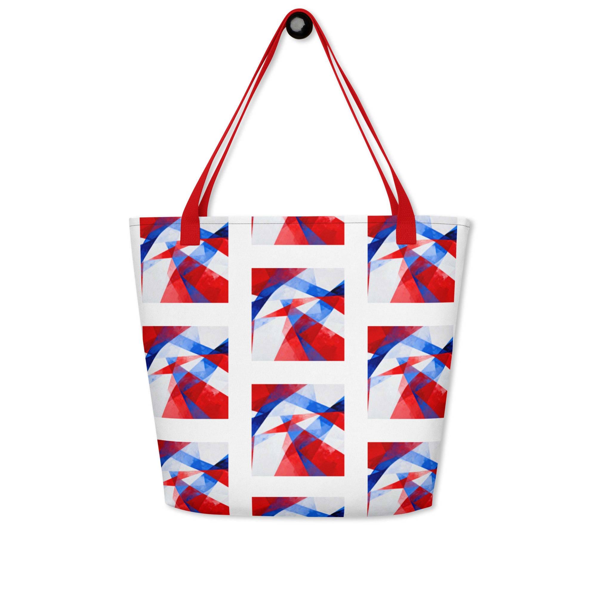 Beach tote bag front view with red handles and white, red, and blue geometric block print