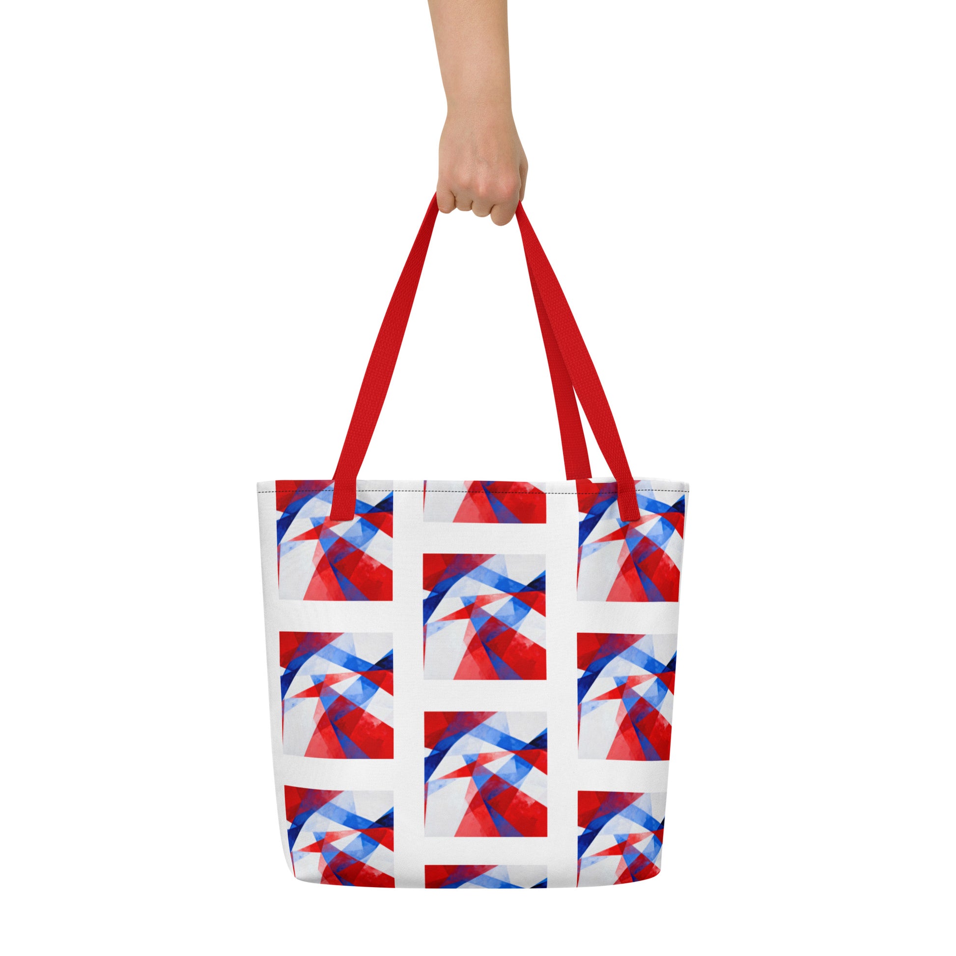 Beach tote bag with red carry handles and white, red, and blue geometric block design