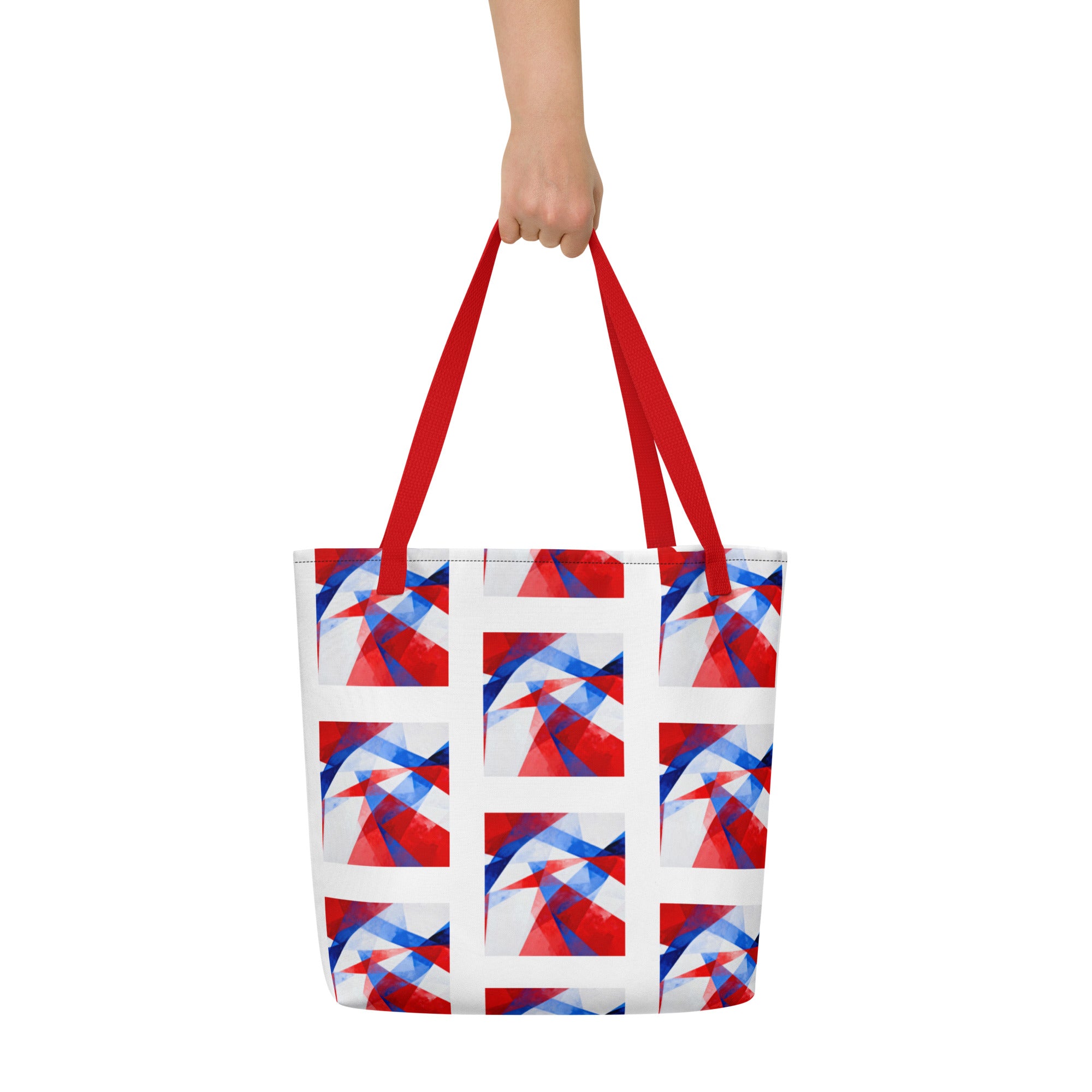 Beach tote bag with red carry handles and white, red, and blue geometric block design