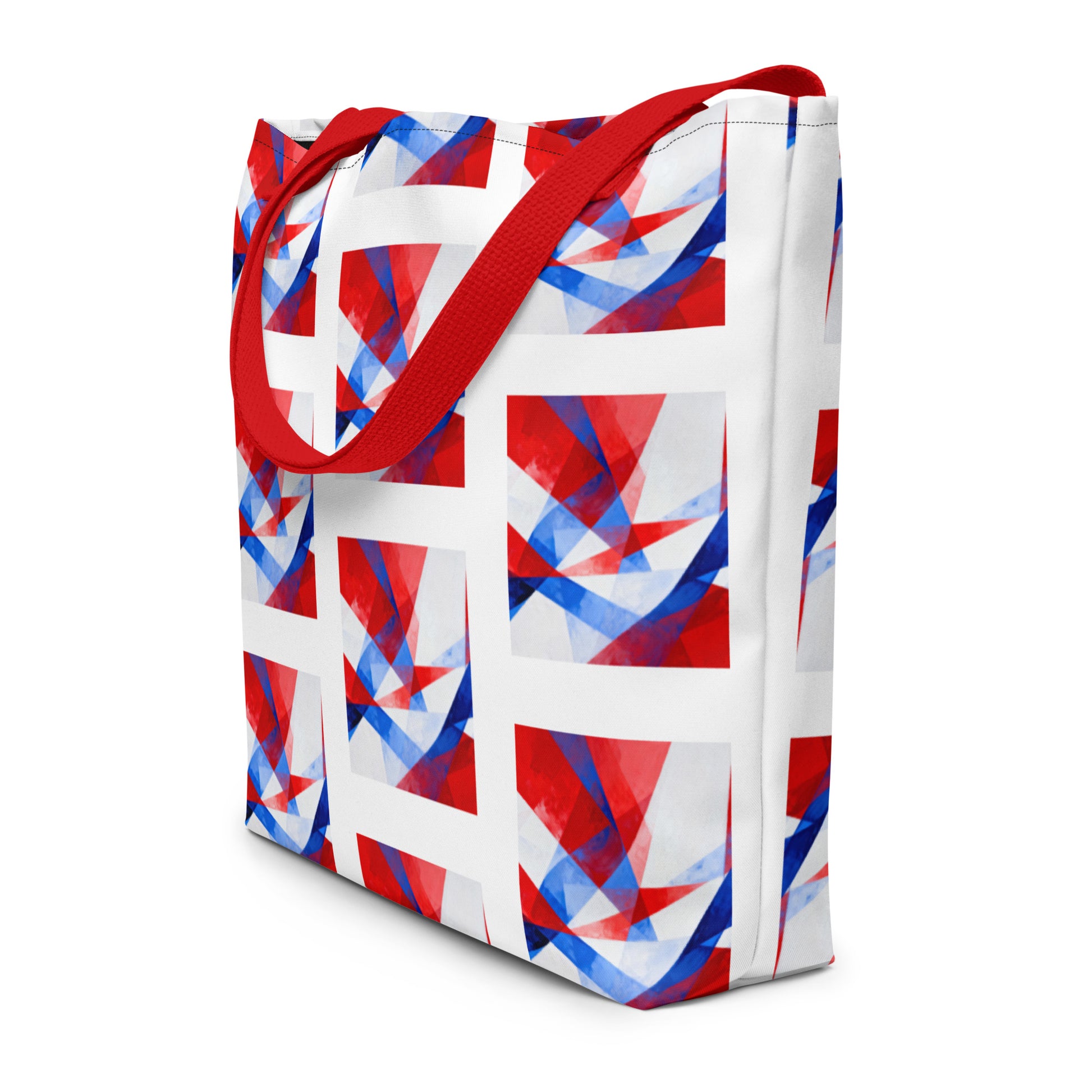 Beach tote bag side view with red handles and white, red, and blue geometric block pattern