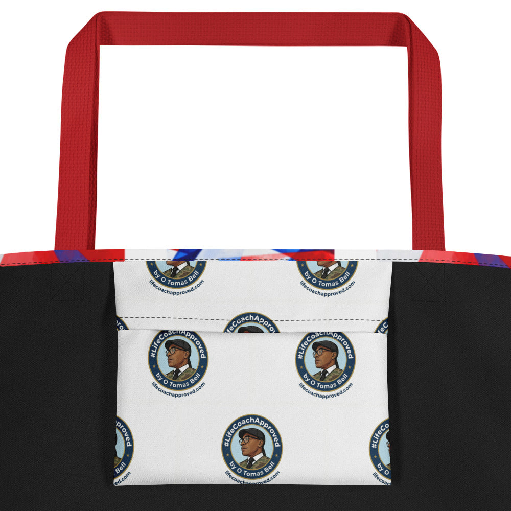 Beach tote bag top view with red handles and white, red, and blue geometric panel print