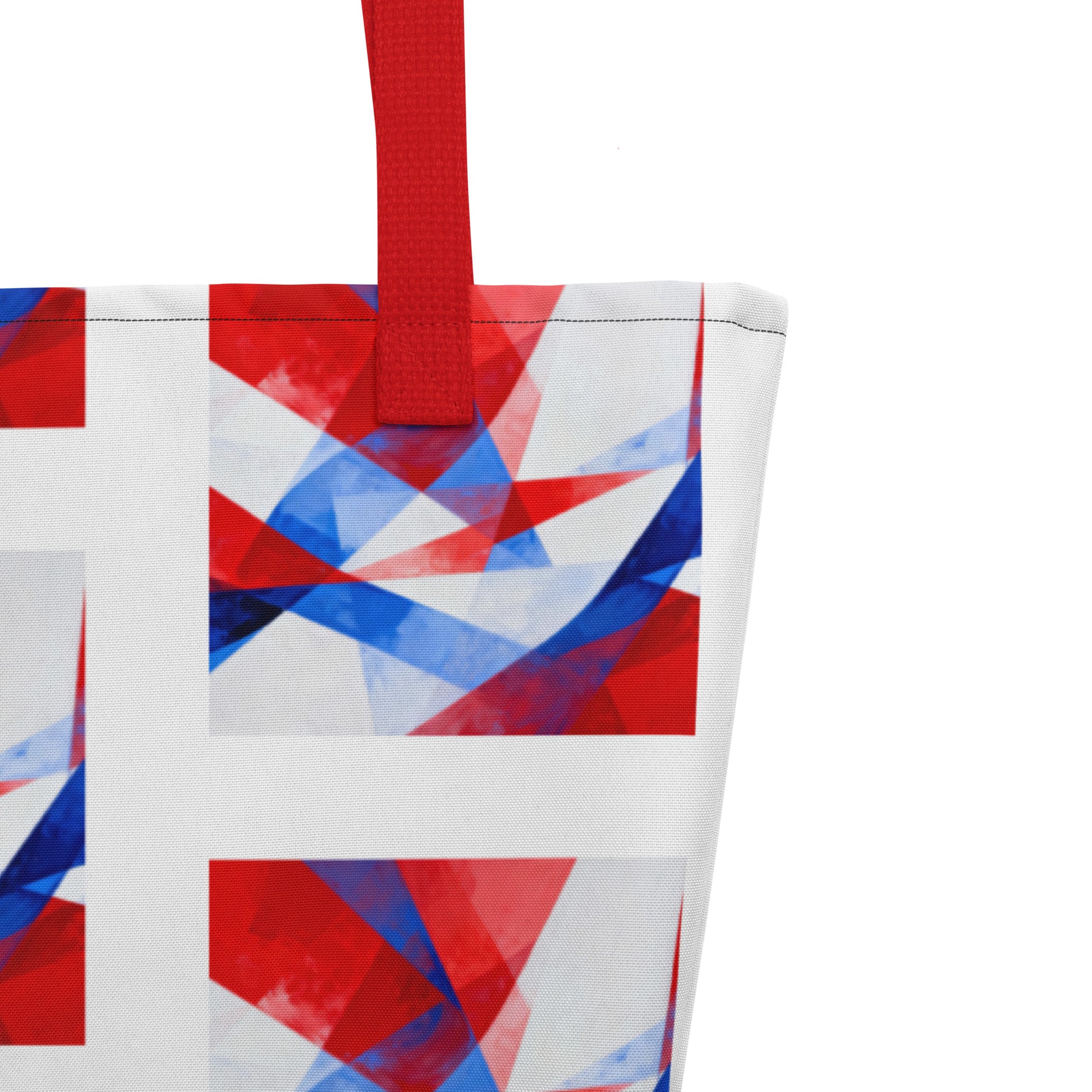 Beach tote bag close-up of white, red, and blue geometric block print with red handle