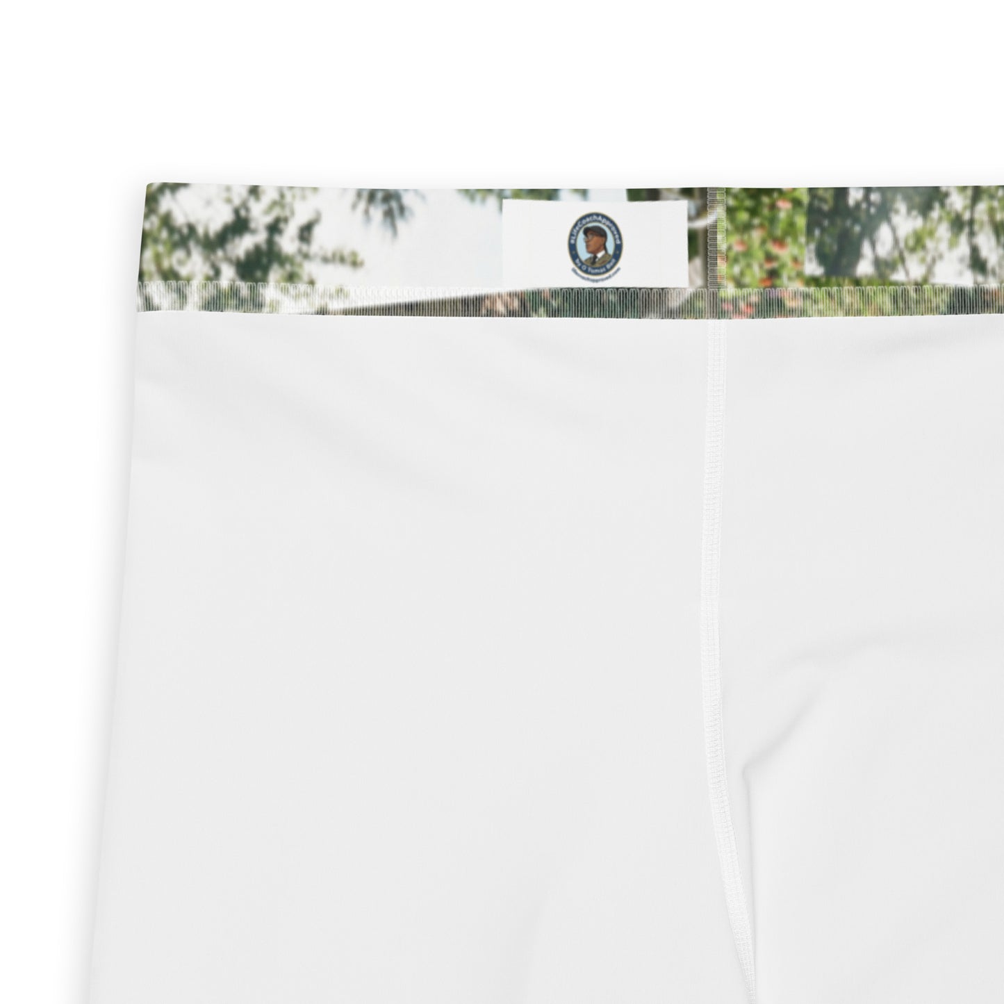 Men's leggings waistband close-up with nature sign graphic and stitched seam