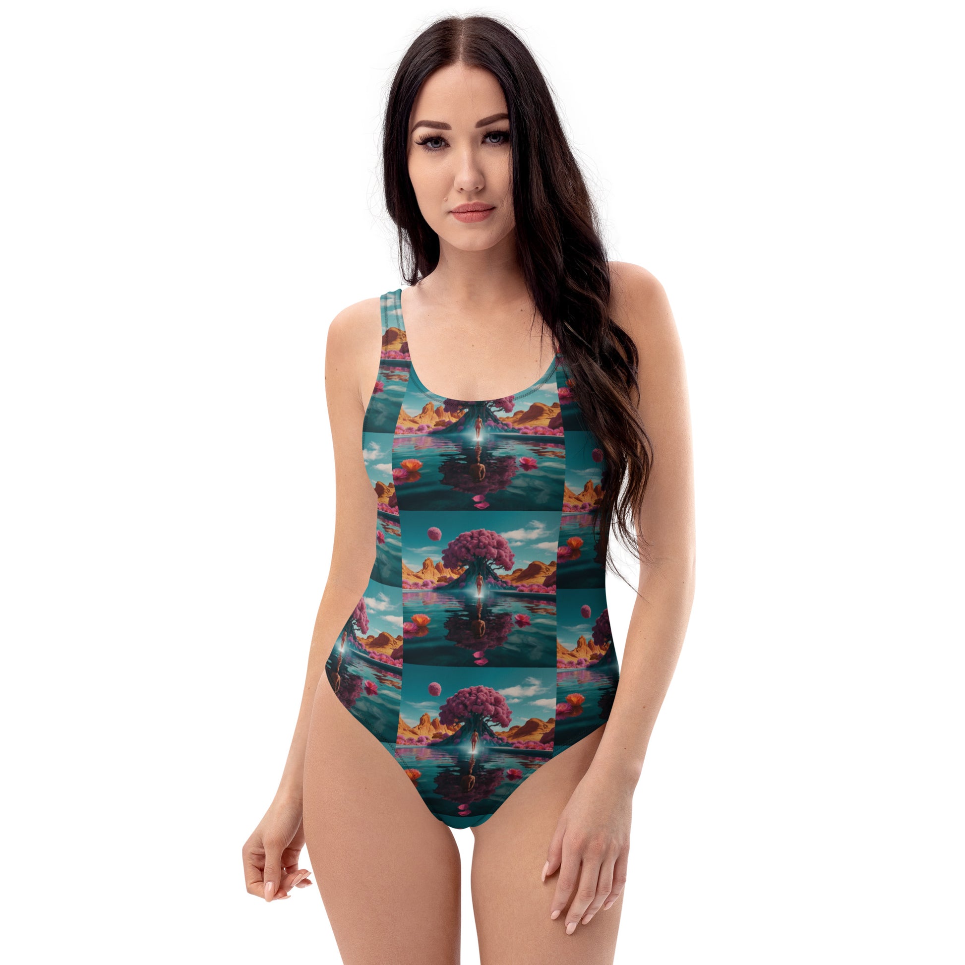 One-piece swimsuit with teal ocean print, scoop front and moderate leg opening.