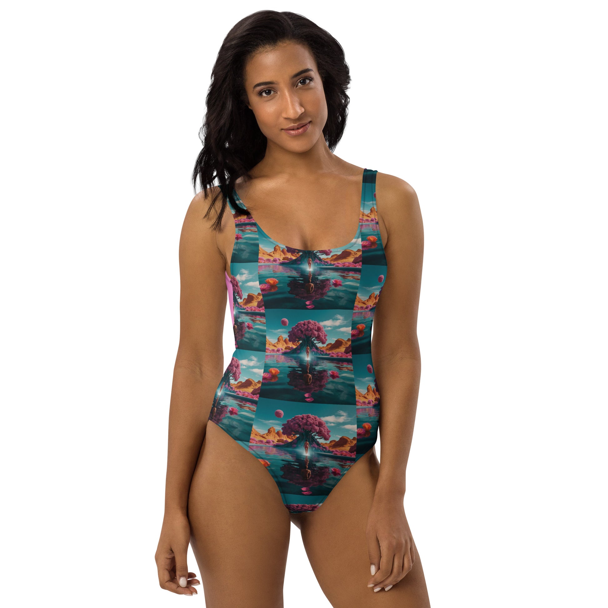 One-piece swimsuit with teal ocean print and scoop neckline, full coverage front.