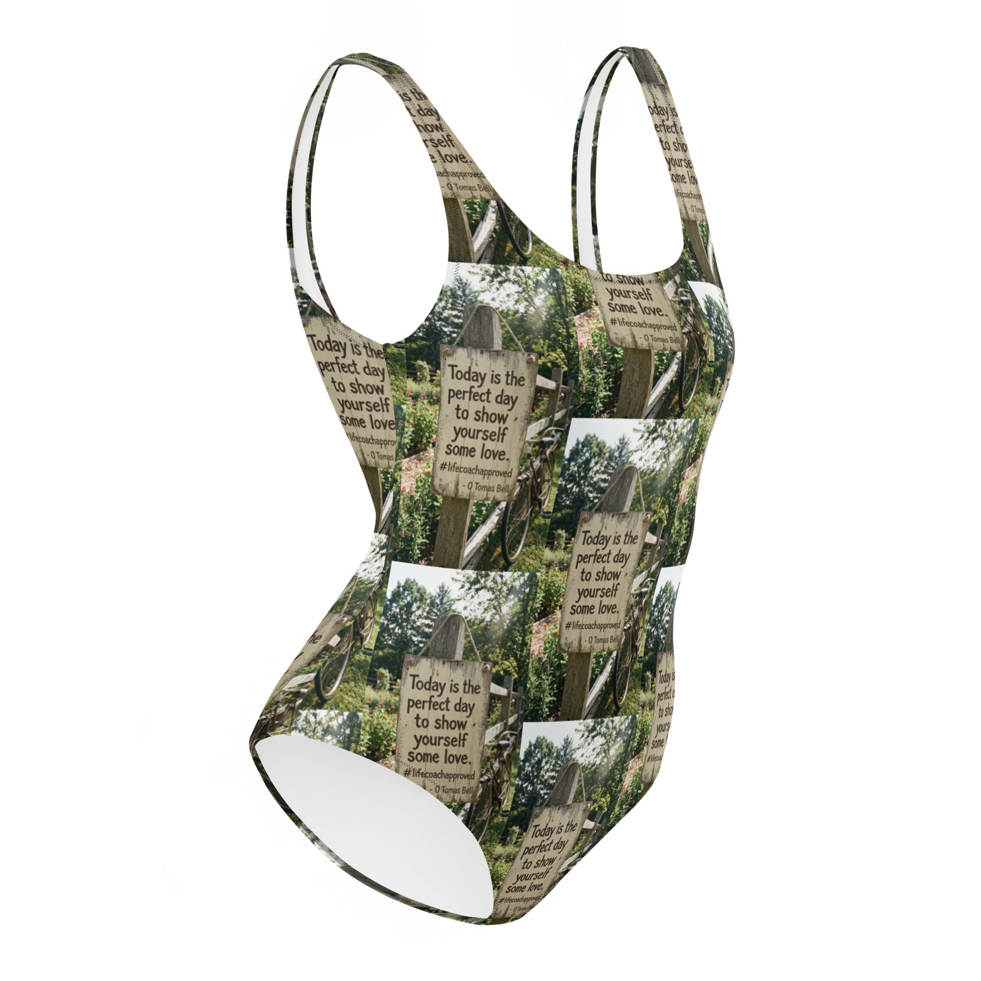 Self love one-piece swimsuit with green forest collage print, racerback straps, high-cut legs