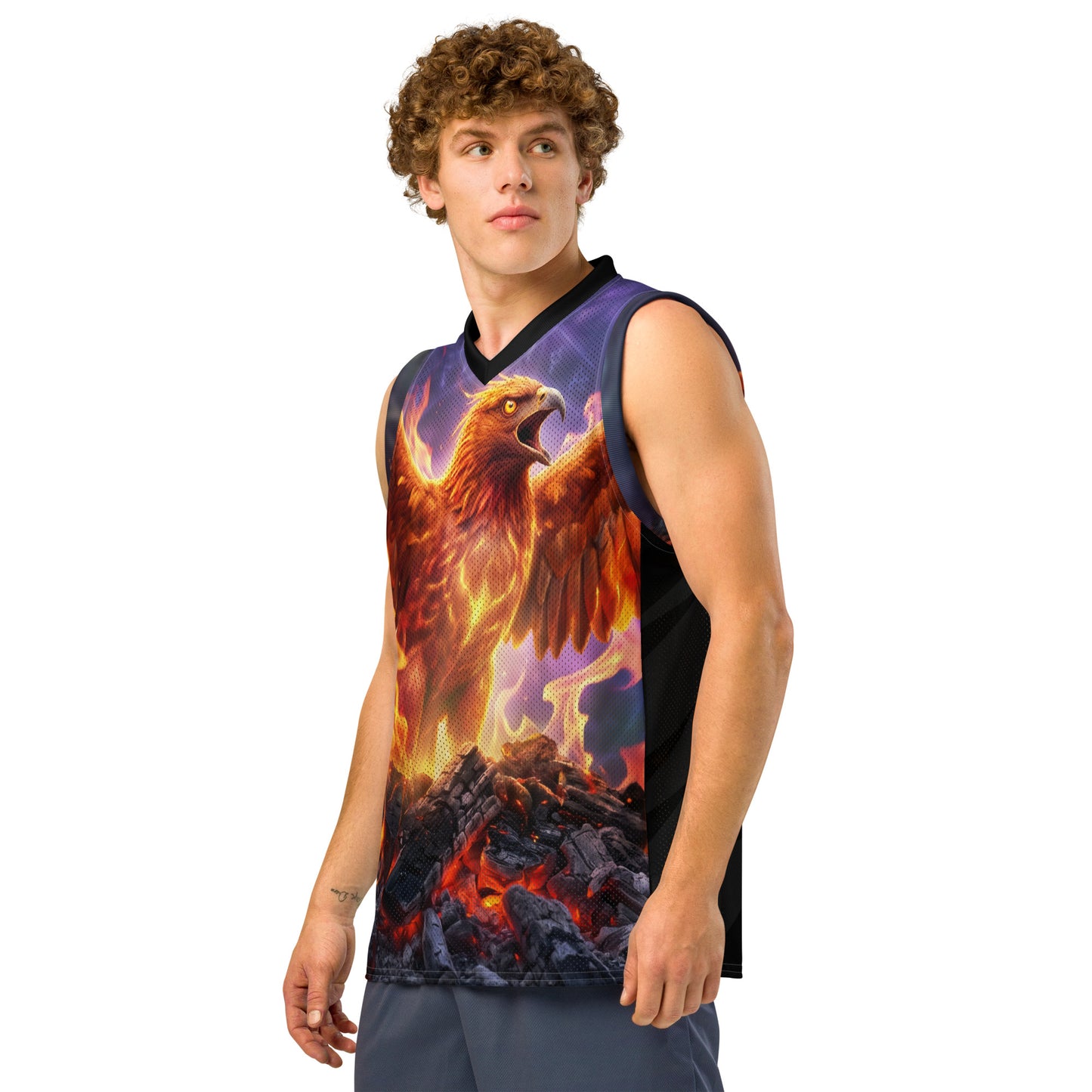 Model front view in basketball jersey with fiery eagle graphic and black V-neck trim.