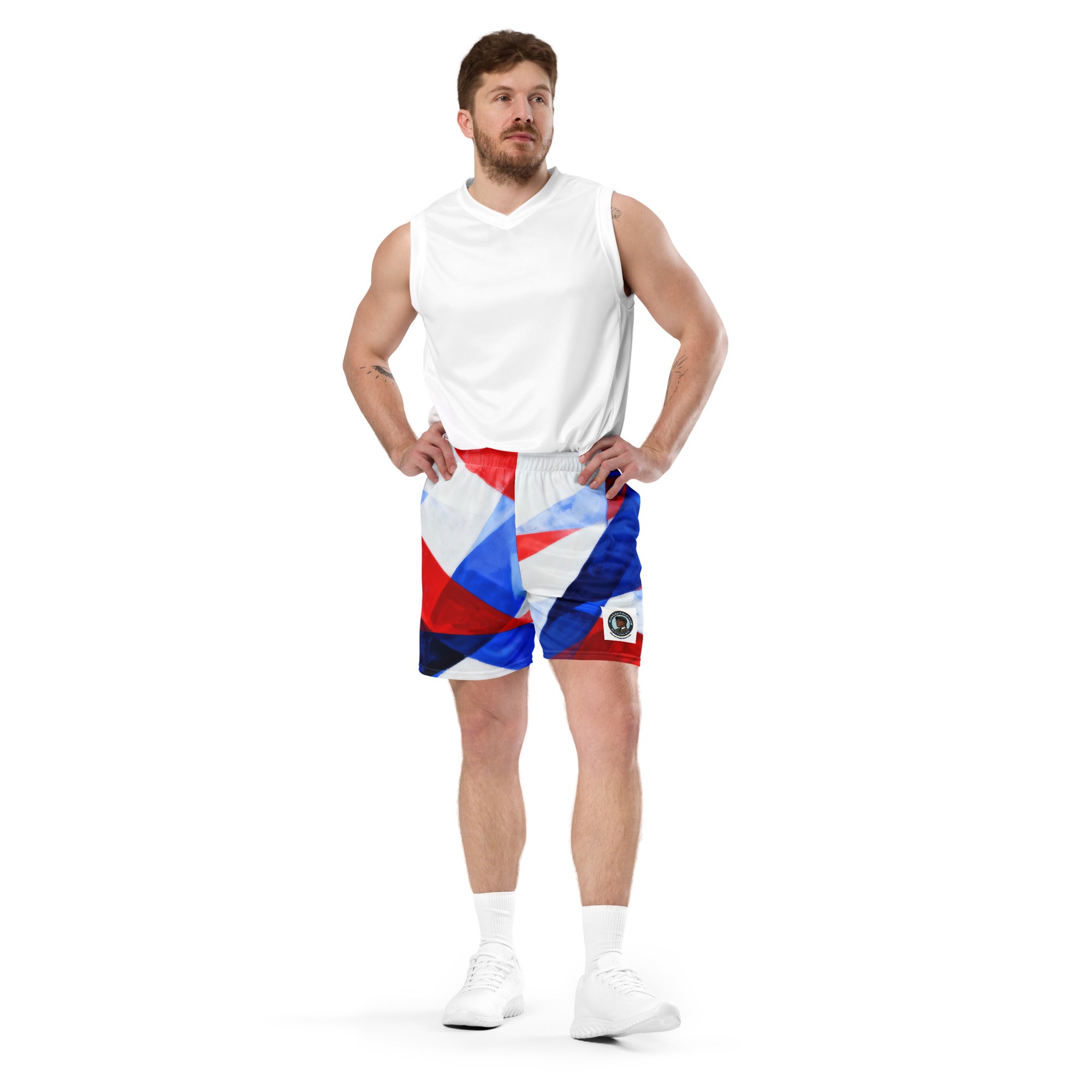 Mesh athletic shorts with white, red, and blue geometric pattern and elastic waistband