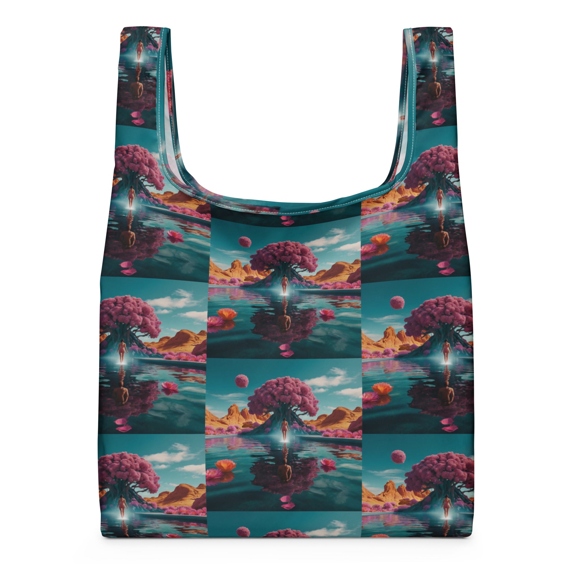 Printed tote bag with teal edging and wide U handles; central fantasy landscape panel on front.