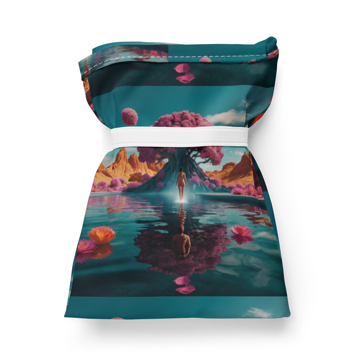 Printed tote bag corner view showing teal trim seam and fantasy landscape graphic on fabric.