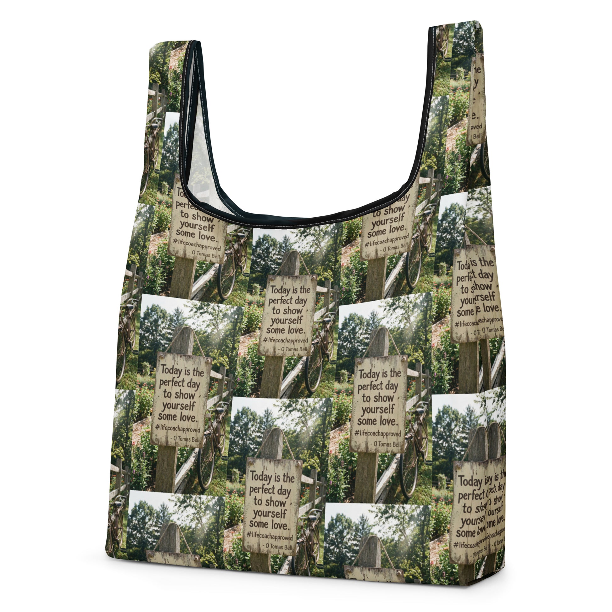 Self Love shopping bag with forest sign print and black-trimmed opening, side angle