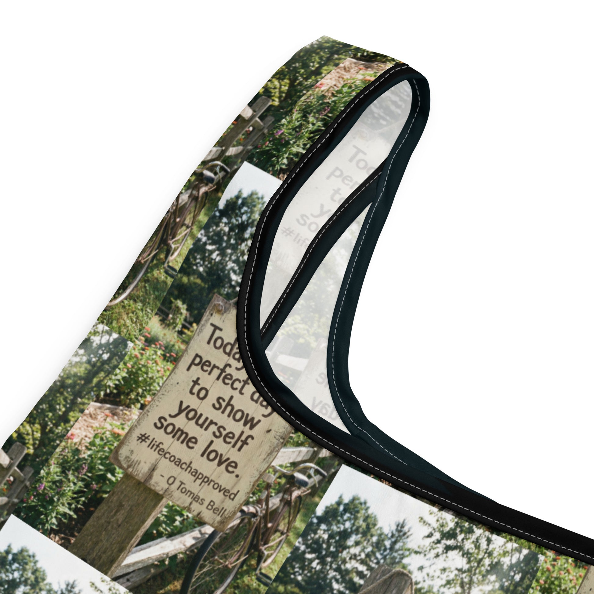Self Love shopping bag detail showing forest sign print and black piped stitching