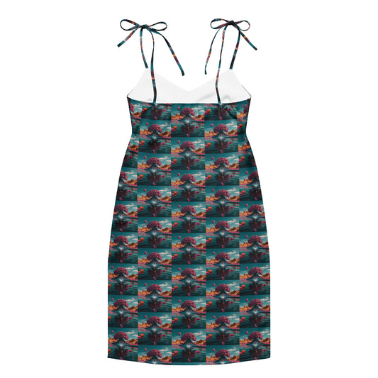 Teal tie-strap midi dress with V-neck and allover bird-and-cloud check print.