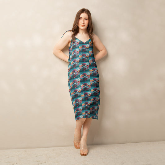 Tie-strap midi dress with teal and coral ocean print, V-neck and fitted bodice.