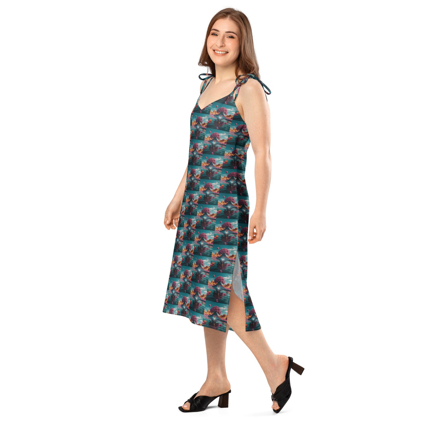 Ocean-print tie-strap midi dress with V-neck and side slit detail at skirt hem.