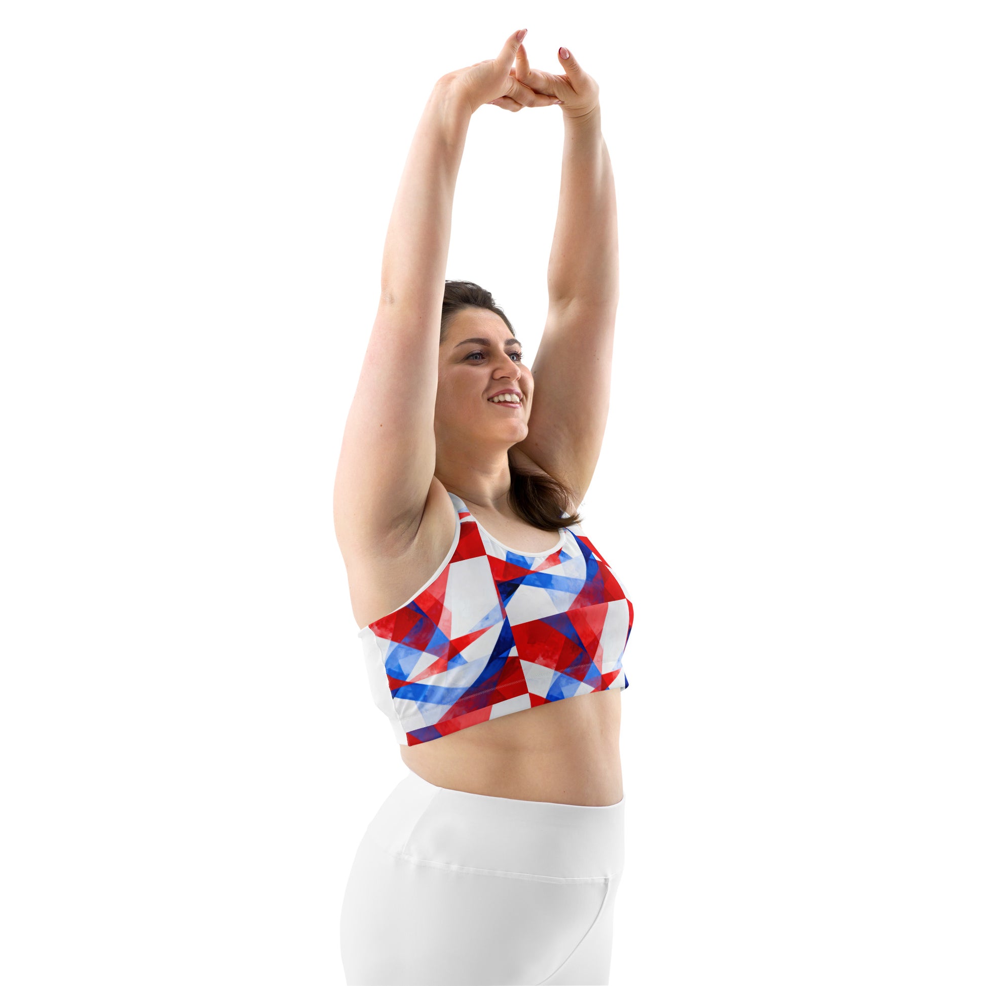 Side view sports bra with red, white, and blue geometric print and white racerback