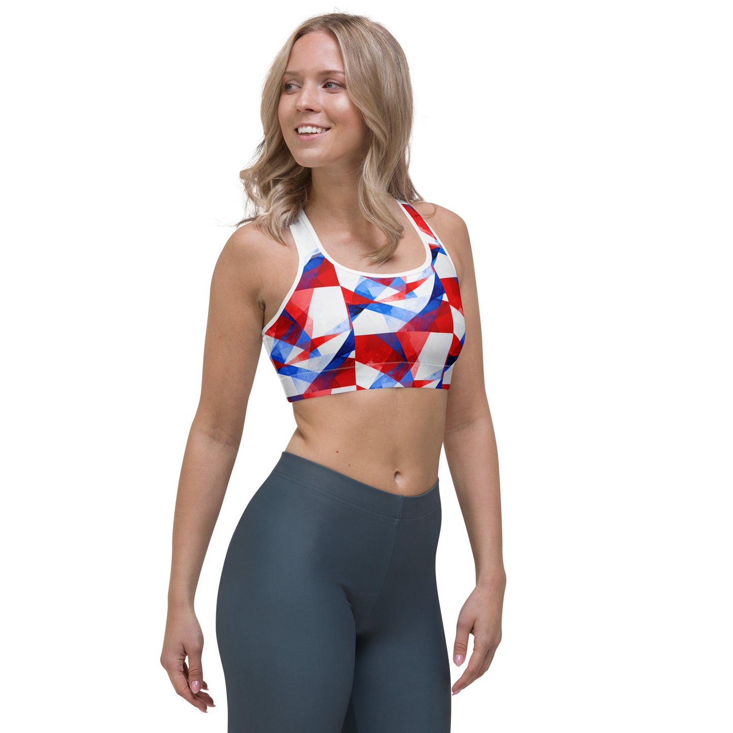 Front view sports bra in red, white, and blue geometric print with racerback