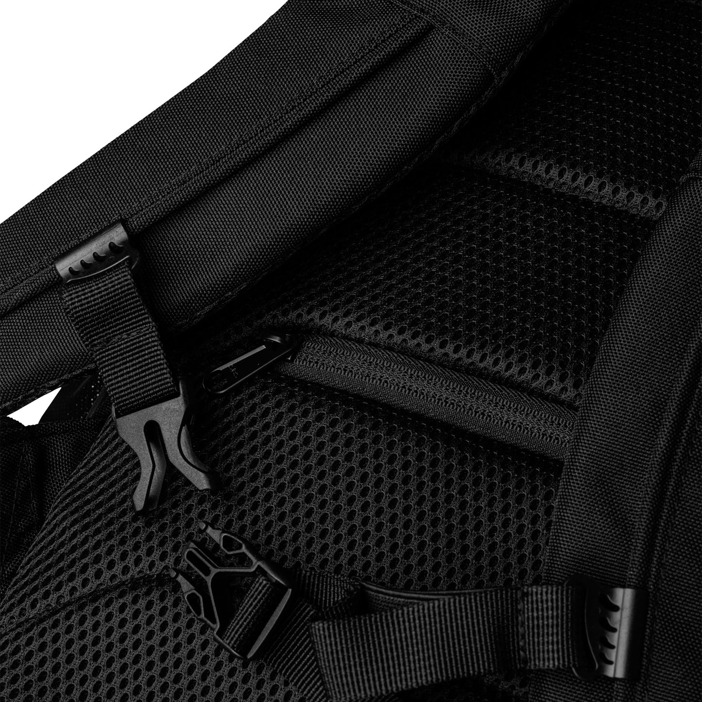 Backpack interior with black mesh pocket and webbing straps, close-up