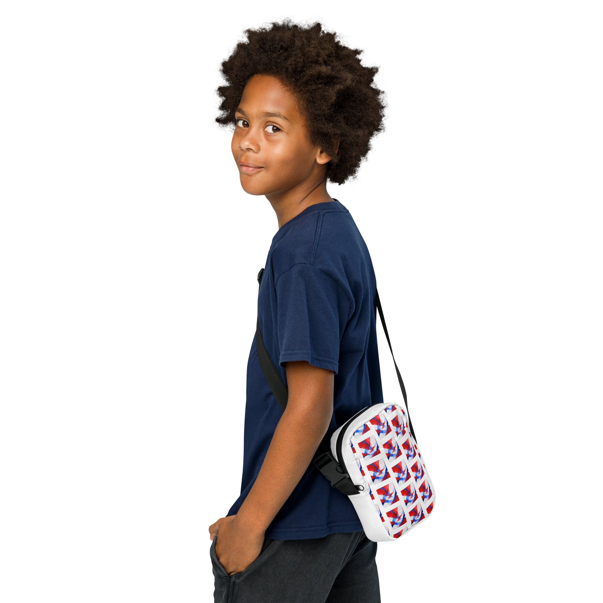 Utility crossbody bag with white UK flag pattern, side profile with black adjustable strap.