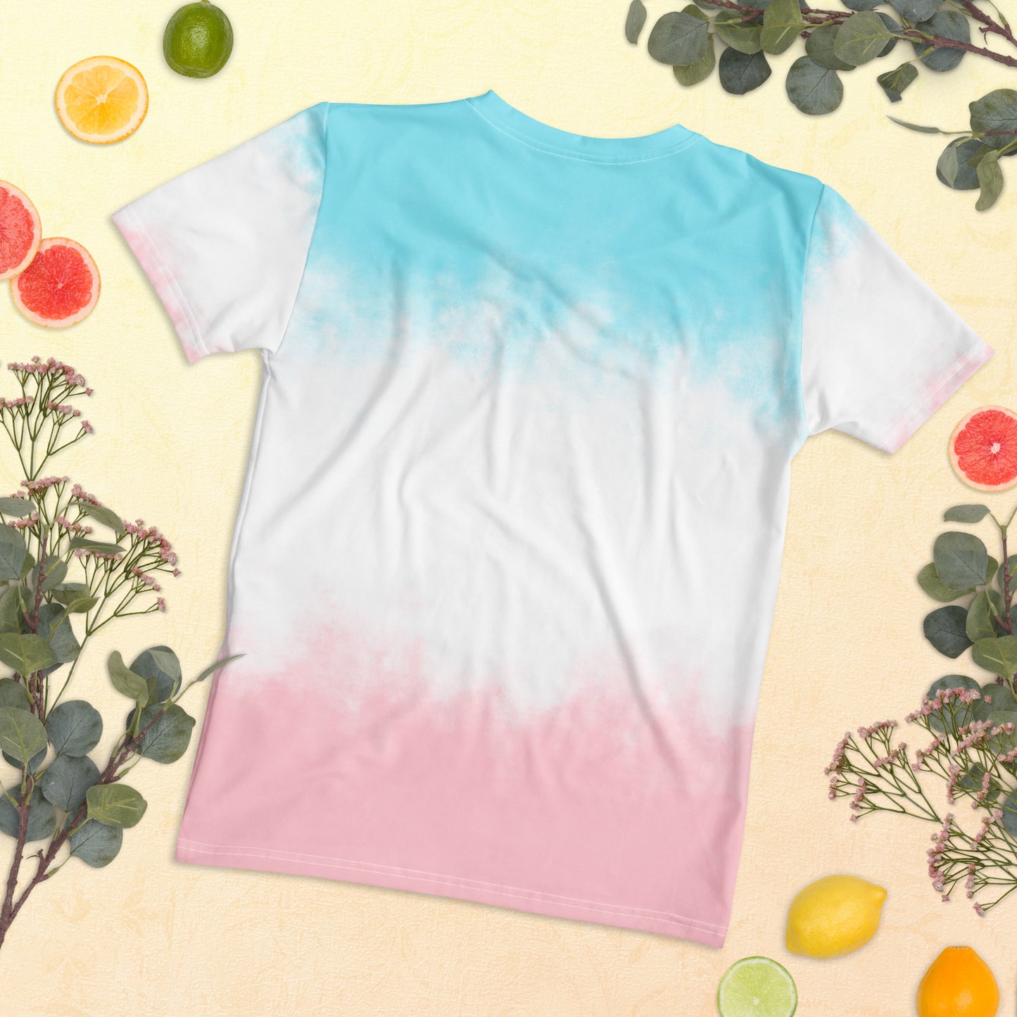 Women’s tie-dye t-shirt, back view: aqua top, white middle, pink bottom.