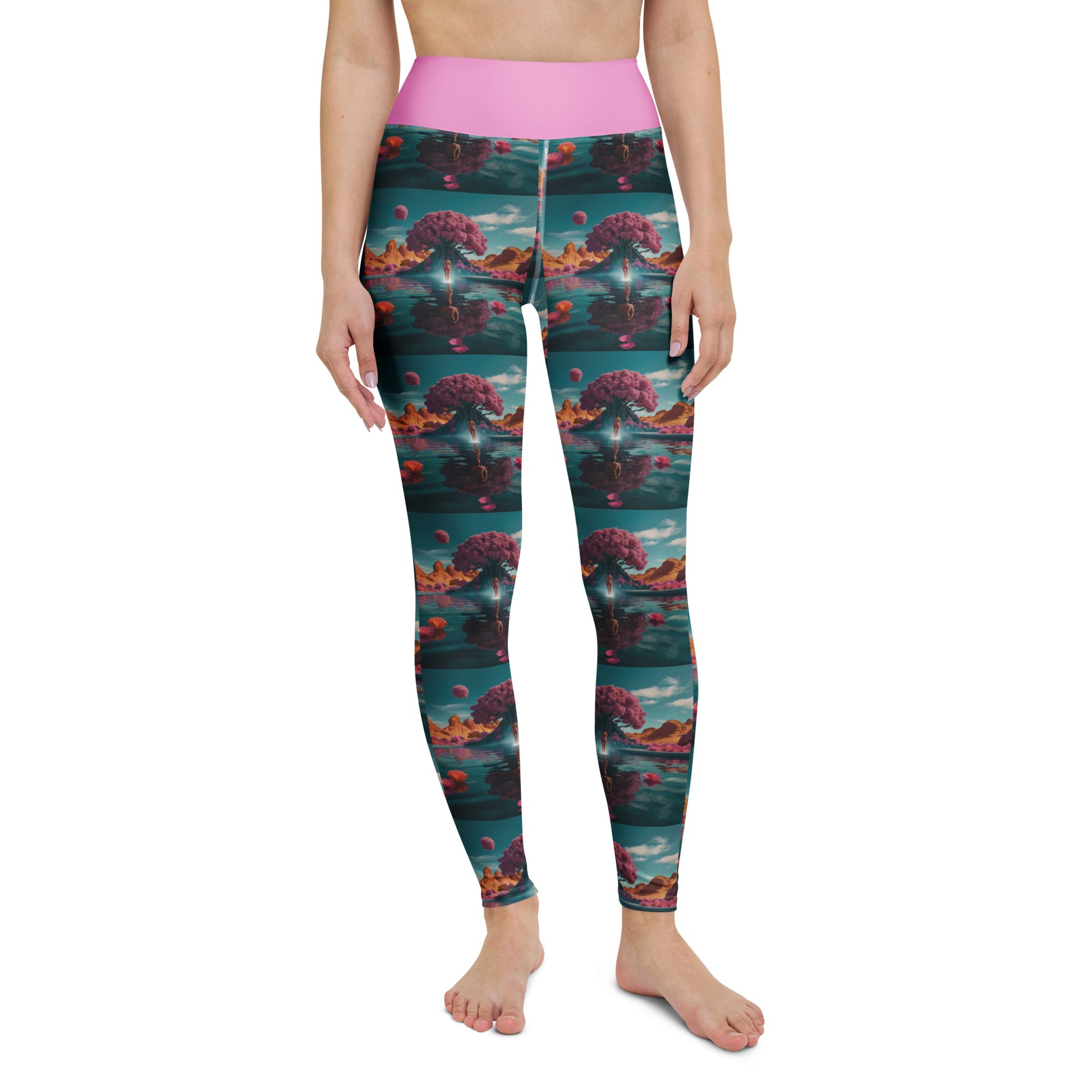Women's yoga leggings on model, pink waistband and teal-and-coral allover print.