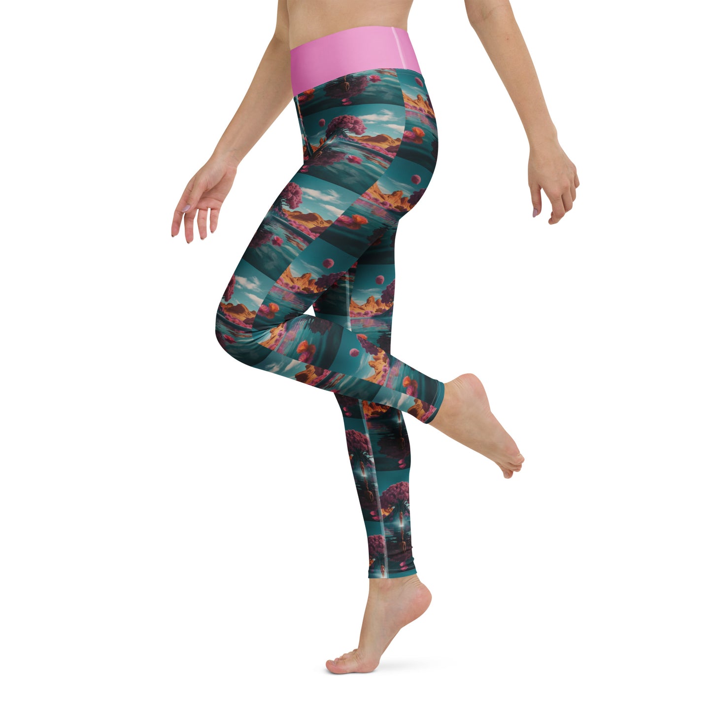 Women's yoga leggings on model in side step, teal-and-coral print with pink waistband.